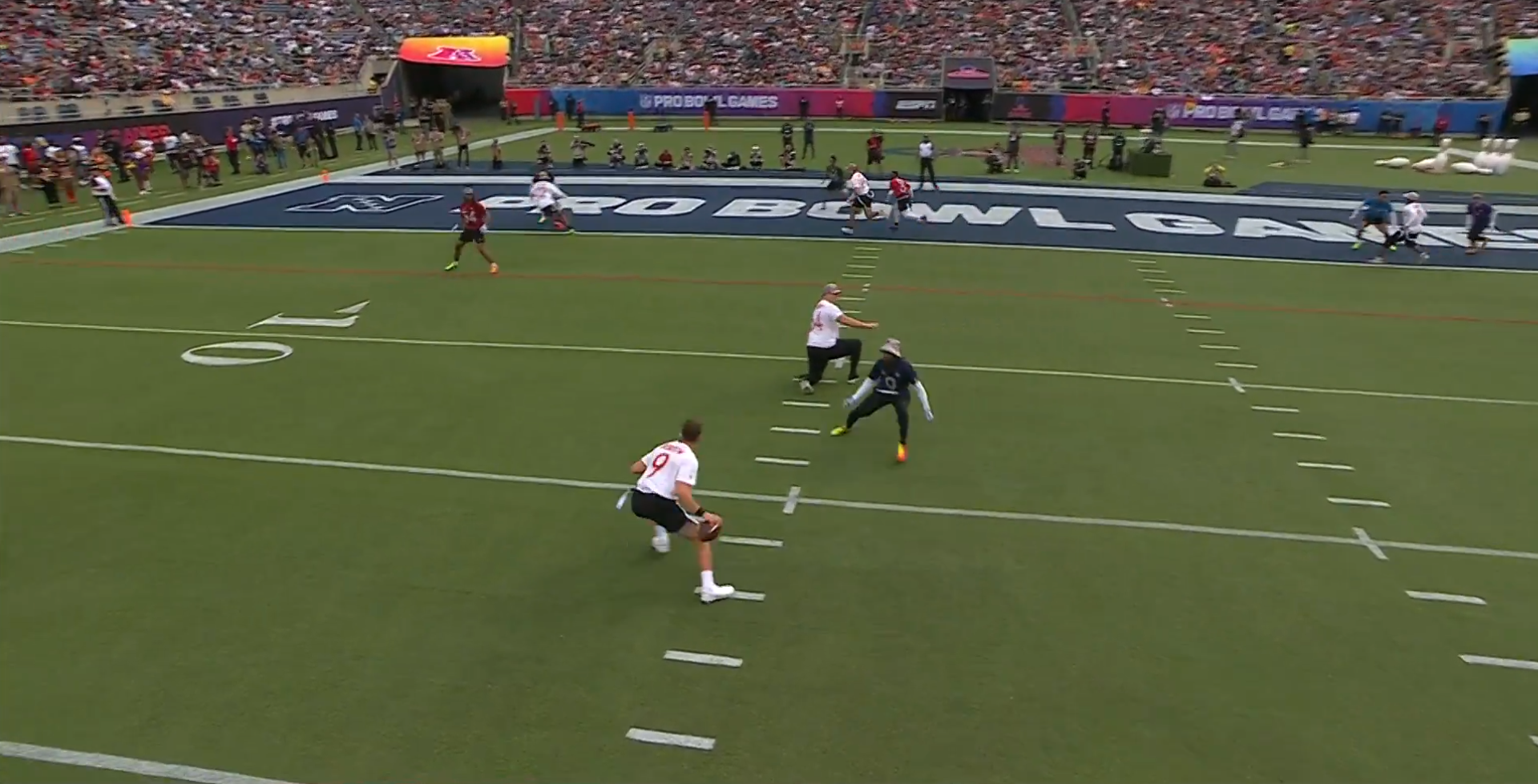 Dallas Cowboys' KaVontae Turpin rushes Joe Burrow in the Pro Bowl Games.