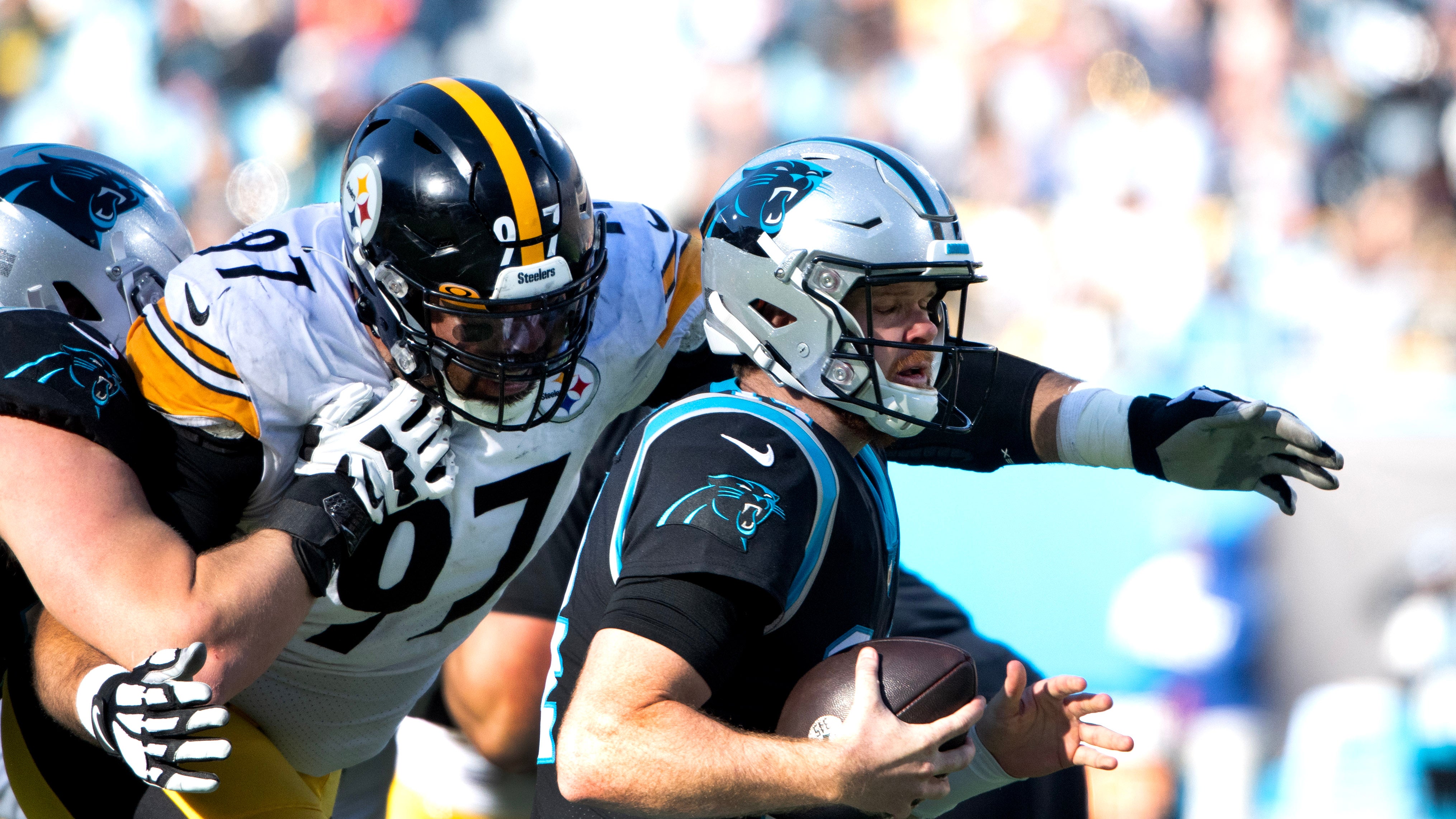 Dec 18, 2022; Charlotte, North Carolina, USA; Pittsburgh Steelers defensive tackle Cameron Heyward (97) pressures Carolina Panthers quarterback Sam Darnold (14) in the second quarter at Bank of America Stadium.