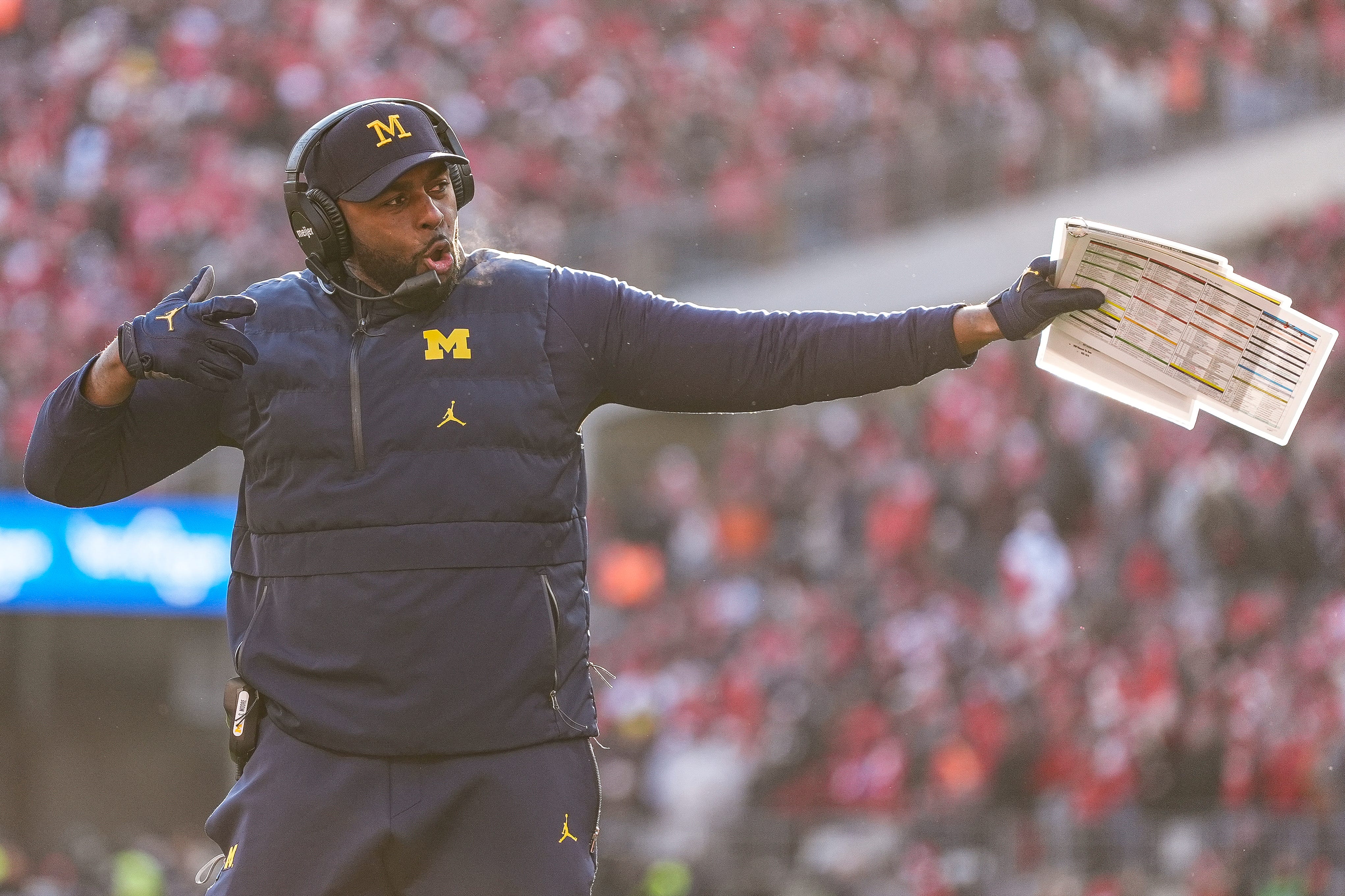 Michigan head coach Sherrone Moore celebrates after place kicker Dominic Zvada scores a field goal against Ohio State during the second half at Ohio Stadium in Columbus, Ohio on Saturday, Nov. 30, 2024.