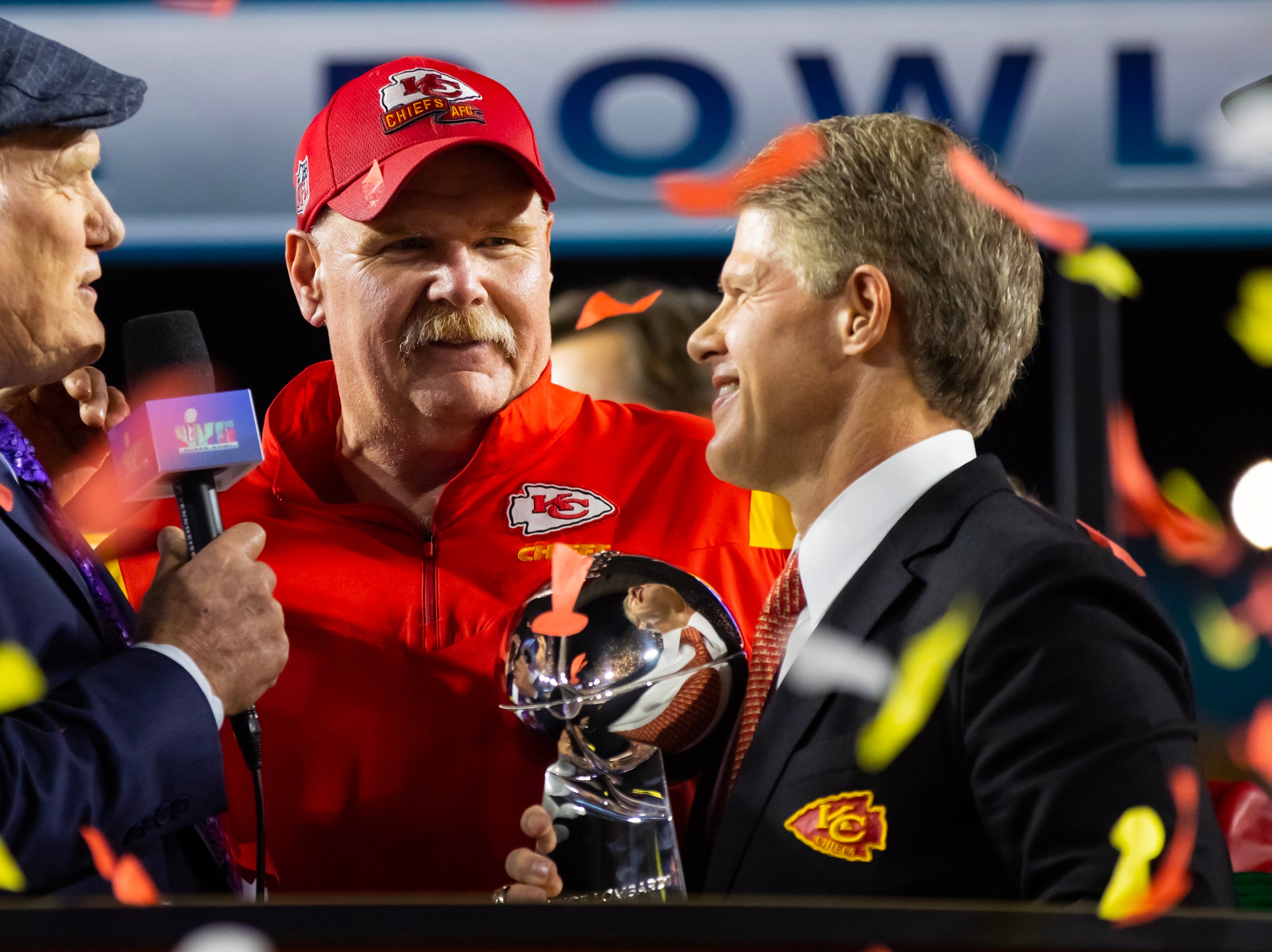 Feb 12, 2023; Glendale, Arizona, US; Kansas City Chiefs head coach Andy Reid (left) celebrates with team owner Clark Hunt and the Vince Lombardi Trophy after winning Super Bowl LVII against the Philadelphia Eagles at State Farm Stadium.