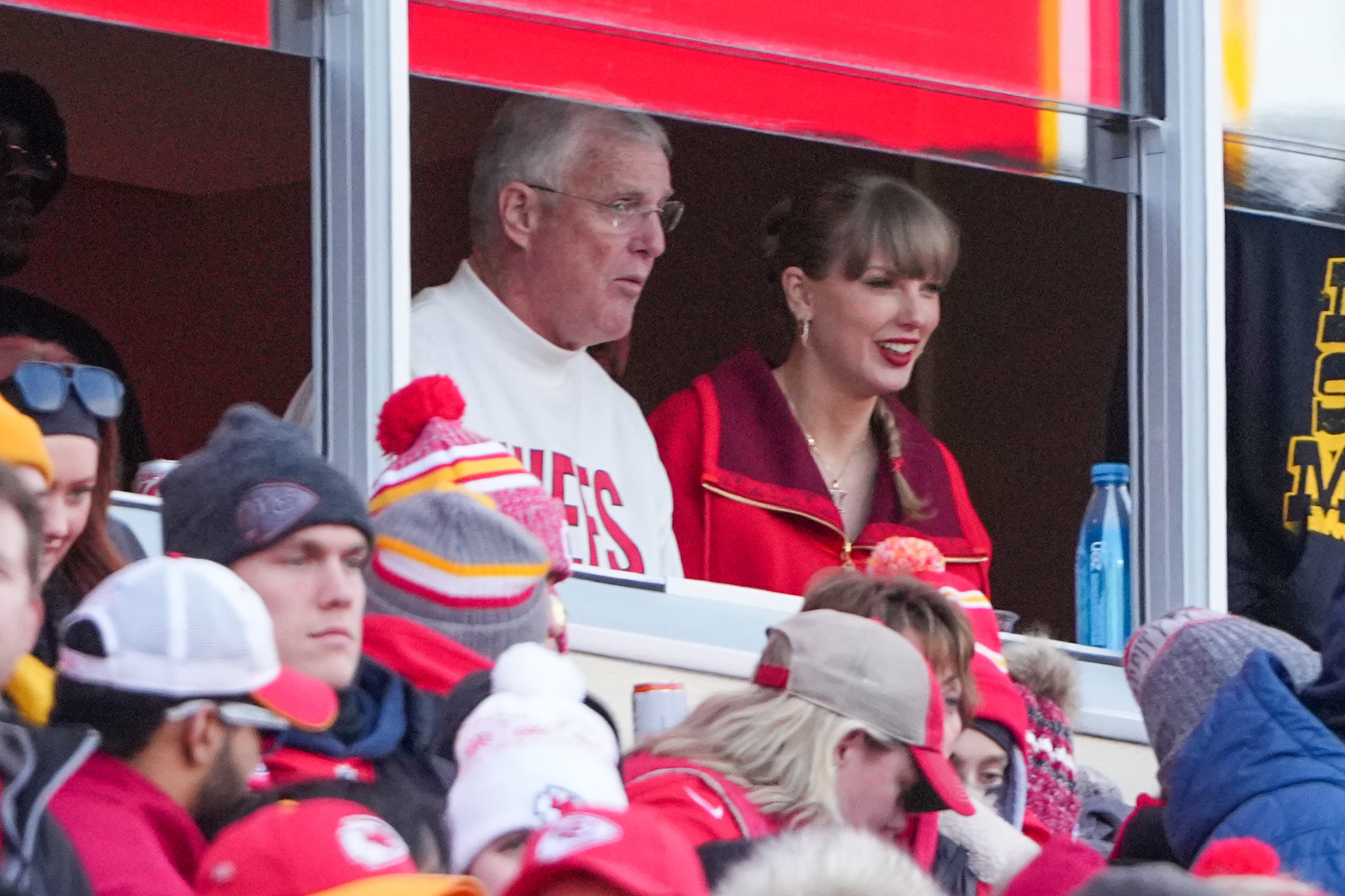 Nov 29, 2024; Kansas City, Missouri, USA; Pop star Taylor Swift watches the game with her father Scott against the Las Vegas Raiders during the first half at GEHA Field at Arrowhead Stadium.