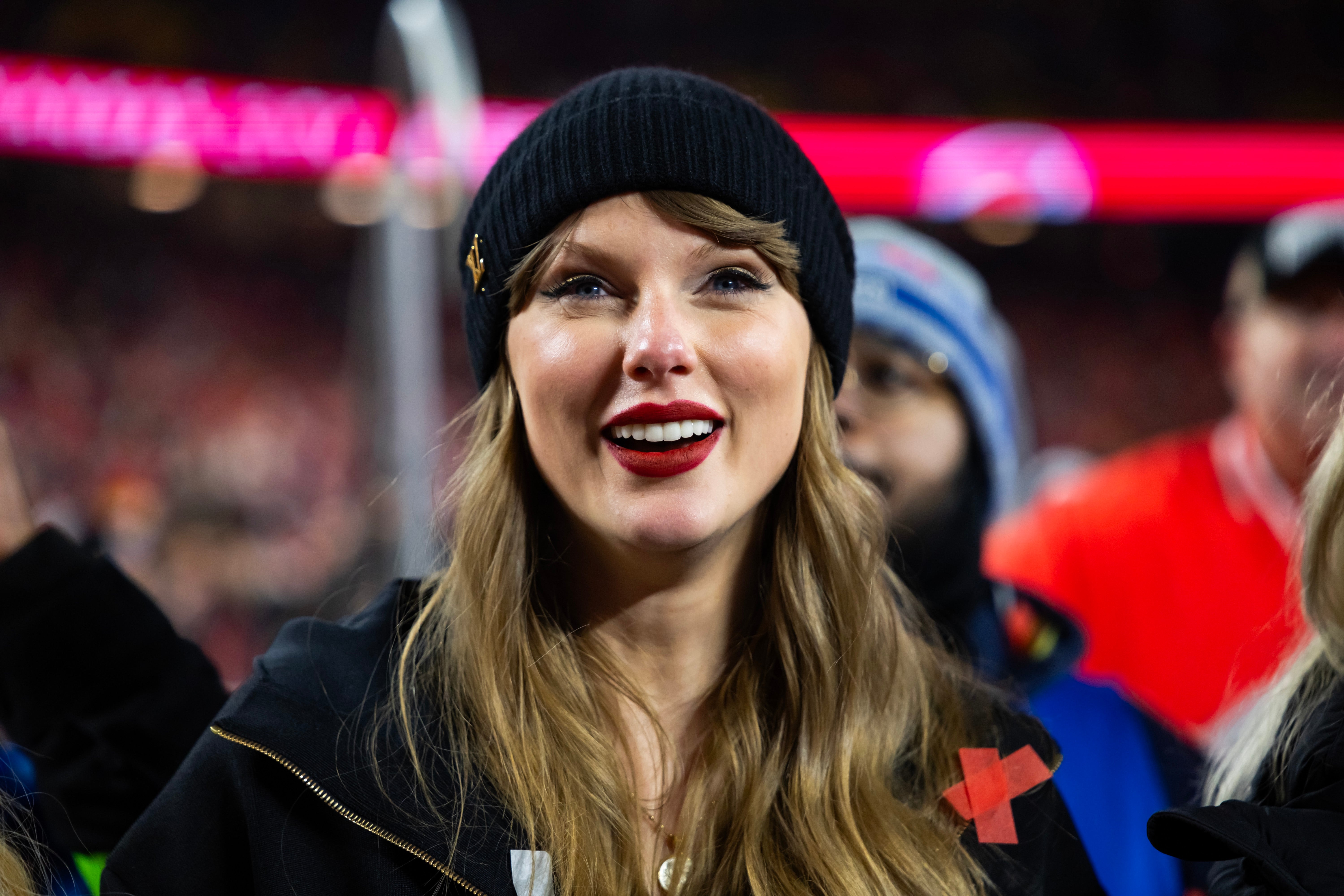 Jan 26, 2025; Kansas City, MO, USA; Recording artist Taylor Swift celebrates after the AFC Championship game against the Buffalo Bills at GEHA Field at Arrowhead Stadium. 