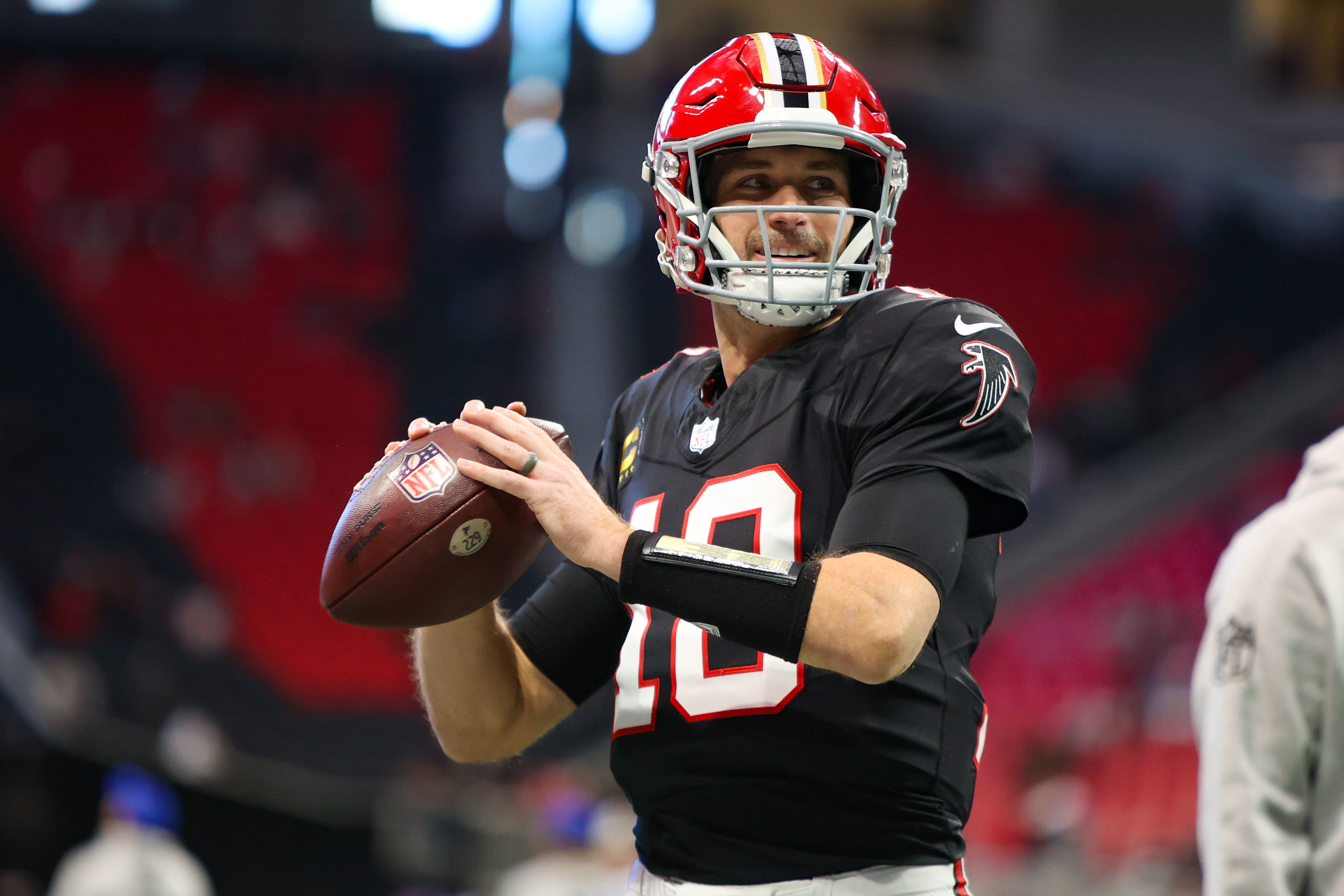 Dec 22, 2024; Atlanta, Georgia, USA; Atlanta Falcons quarterback Kirk Cousins (18) prepares for a game against the New York Giants at Mercedes-Benz Stadium.