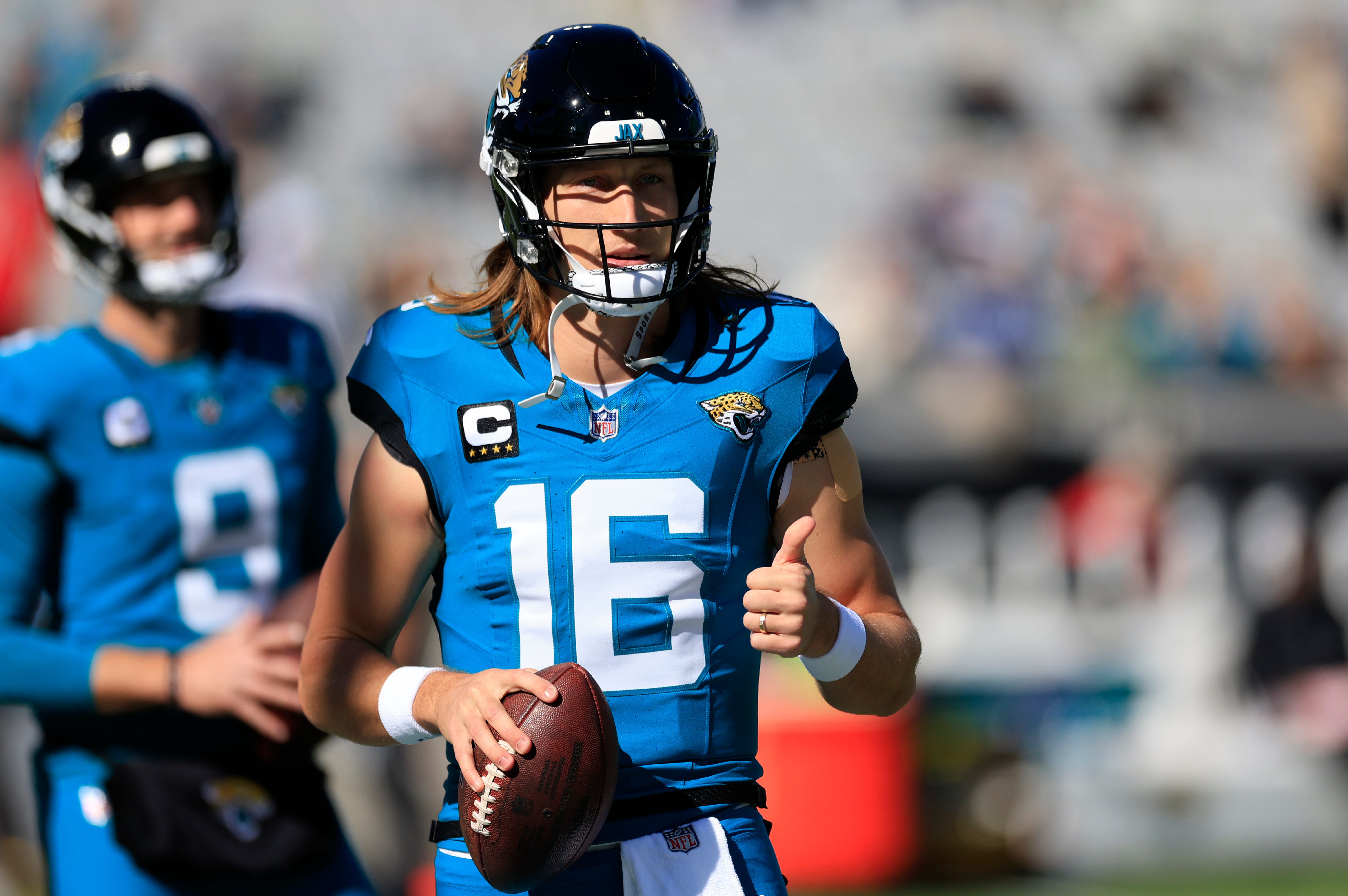 Jacksonville Jaguars quarterback Trevor Lawrence (16) gives a thumbs up before an NFL football matchup Sunday, Dec. 1, 2024 at EverBank Stadium in Jacksonville, Fla.