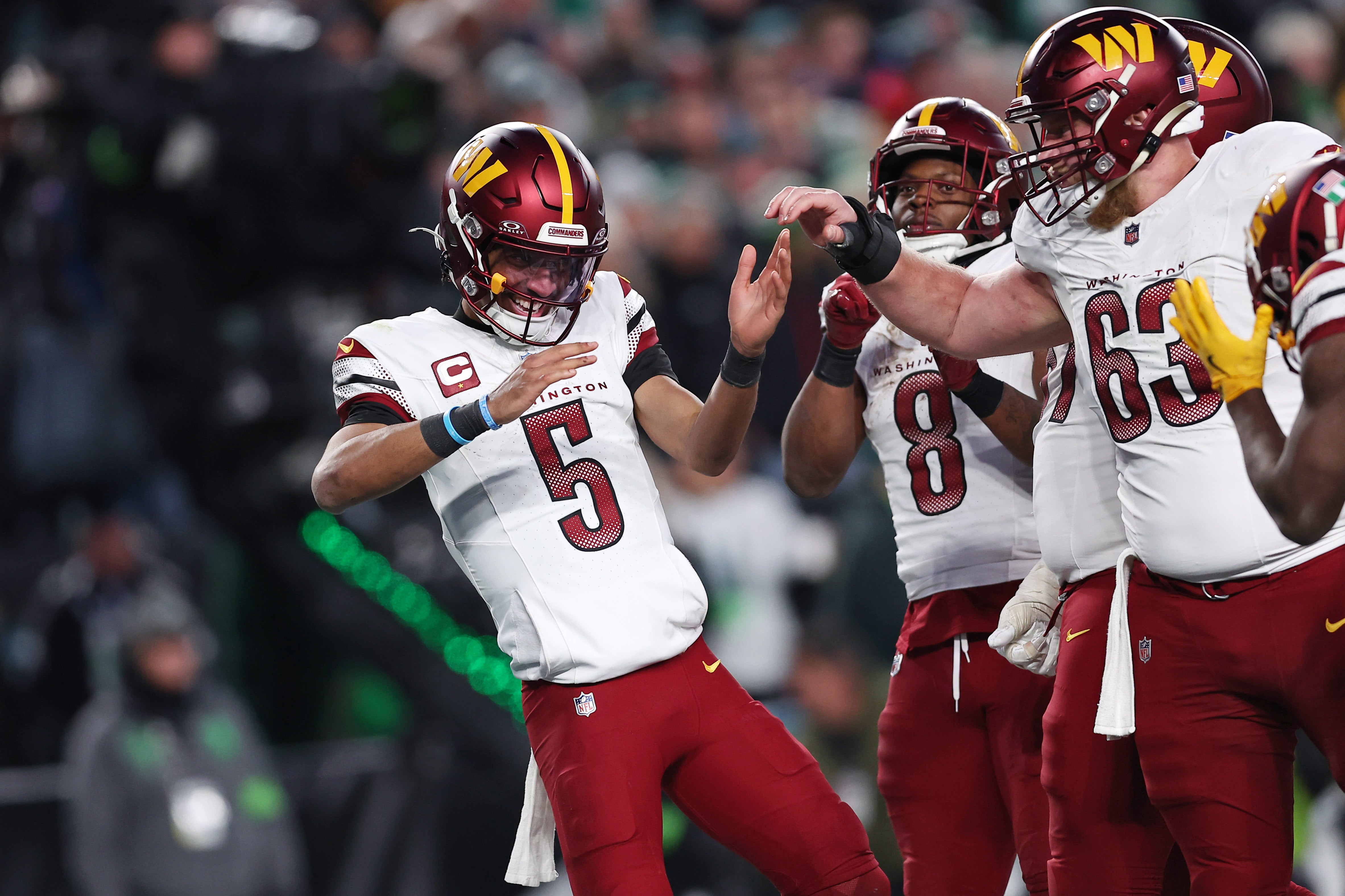 Jan 26, 2025; Philadelphia, PA, USA; Washington Commanders quarterback Jayden Daniels (5) celebrates after a play against the Philadelphia Eagles during the second half in the NFC Championship game at Lincoln Financial Field.