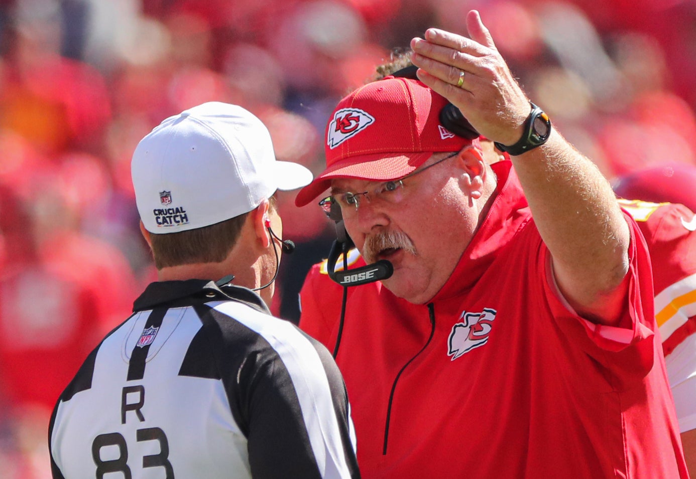 Oct 13, 2019; Kansas City, MO, USA; Kansas City Chiefs head coach Andy Reid talks with referee Shaun Hochuli (83) during the first half against the Houston Texans at Arrowhead Stadium.