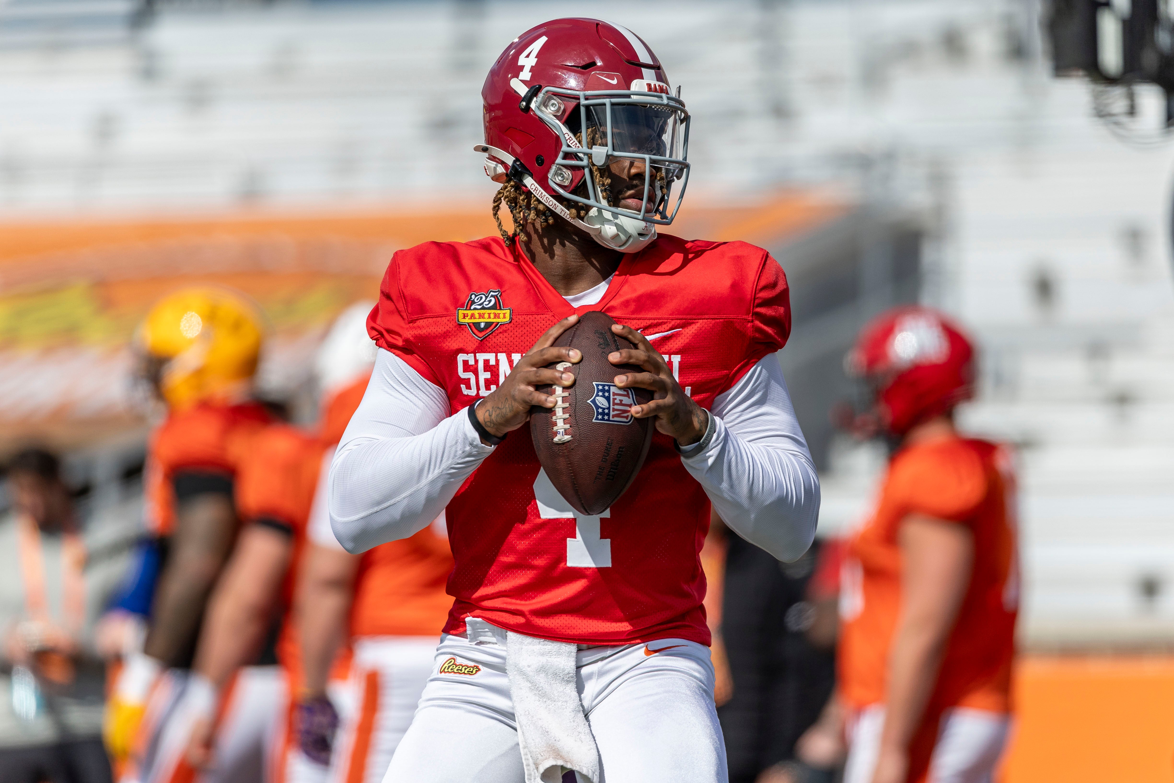 Jan 29, 2025; Mobile, AL, USA; American team quarterback Jalen Milroe of Alabama (4) warms up during Senior Bowl practice for the National team at Hancock Whitney Stadium.