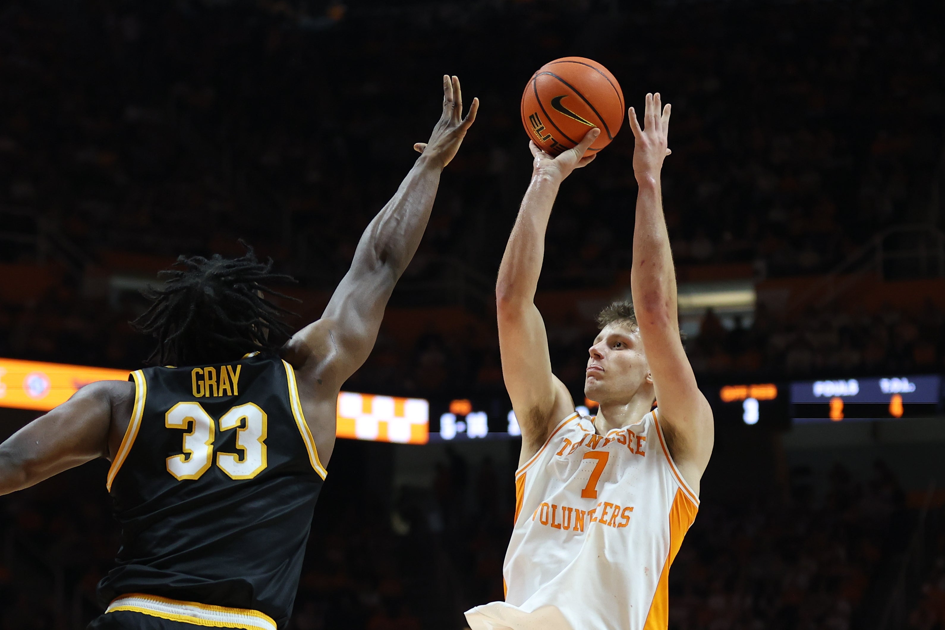 Feb 5, 2025; Knoxville, Tennessee, USA; Tennessee Volunteers forward Igor Milicic Jr. (7) shoots the ball against Missouri Tigers center Josh Gray (33) during the first half at Thompson-Boling Arena at Food City Center.