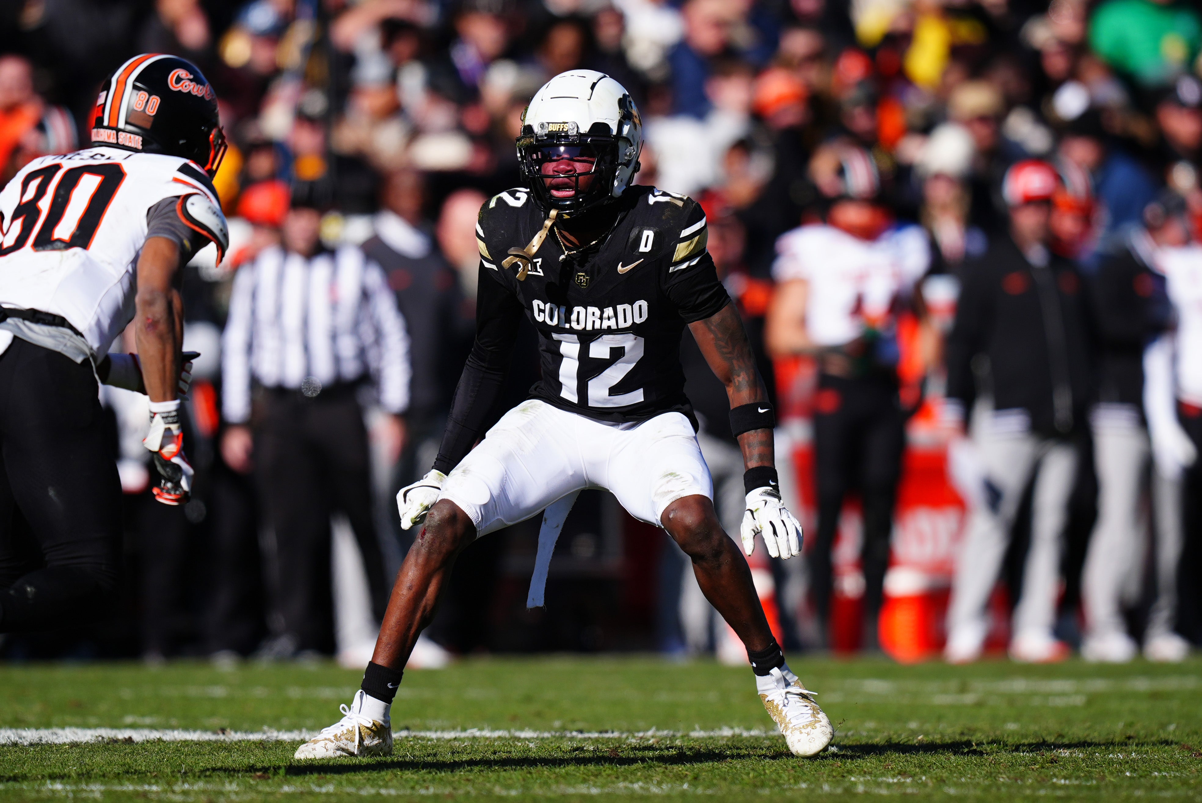 Nov 29, 2024; Boulder, Colorado, USA; Colorado Buffaloes cornerback Travis Hunter (12) during the second quarter against the Oklahoma State Cowboys at Folsom Field. Mandatory Credit: Ron Chenoy-Imagn Images