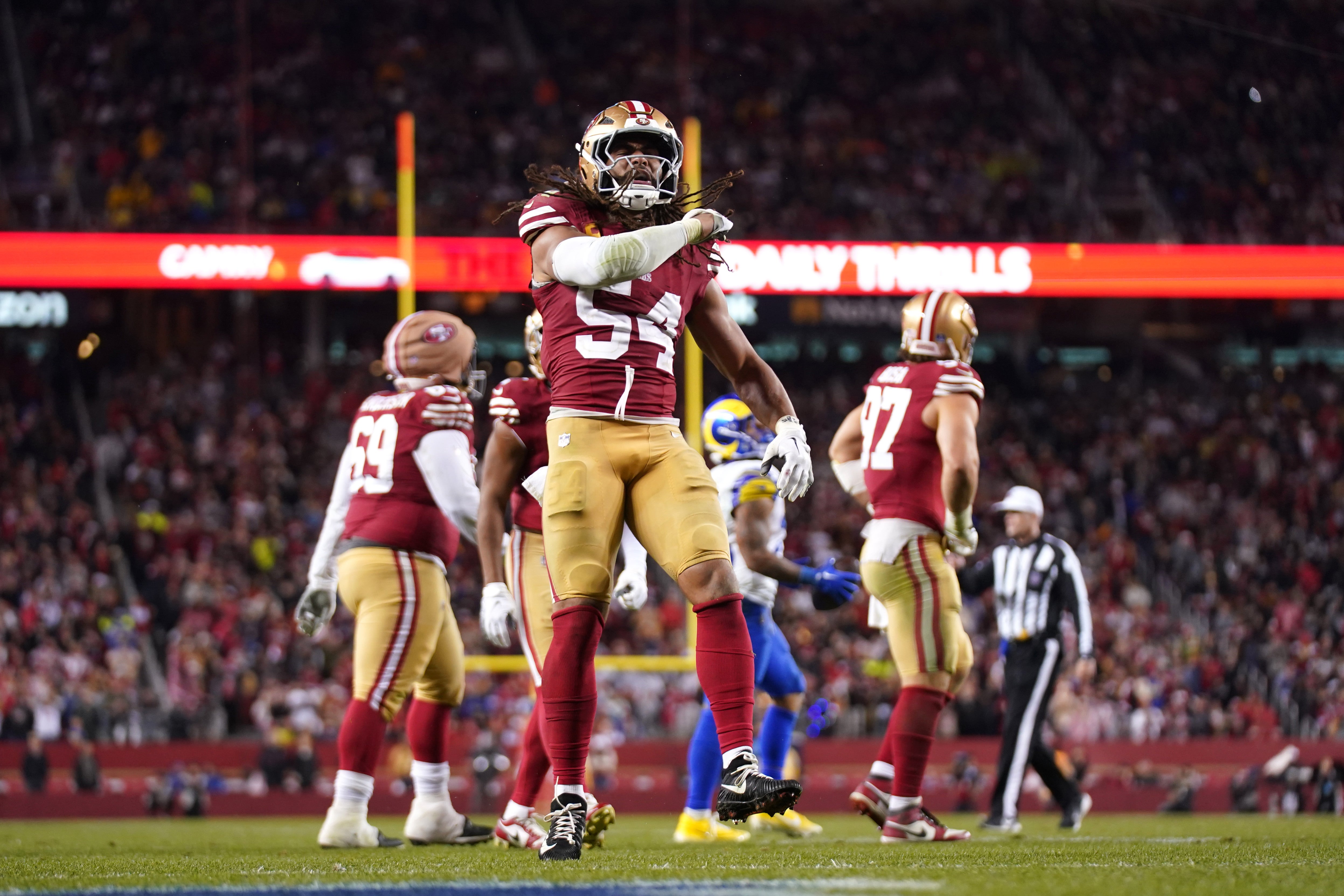 San Francisco 49ers linebacker Fred Warner (54) reacts after making a tackle against the Los Angeles Rams in the fourth quarter at Levi's Stadium.