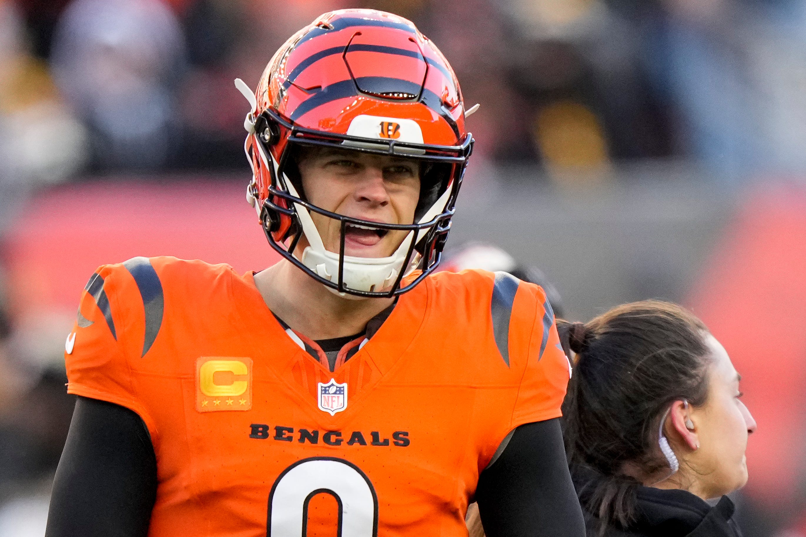 Cincinnati Bengals quarterback Joe Burrow (9) shouts back to the sideline between plays in the fourth quarter of the NFL Week 13 game between the Cincinnati Bengals and the Pittsburgh Steelers at Paycor Stadium in downtown Cincinnati on Sunday, Dec. 1, 2024. The Steelers won 44-38.  