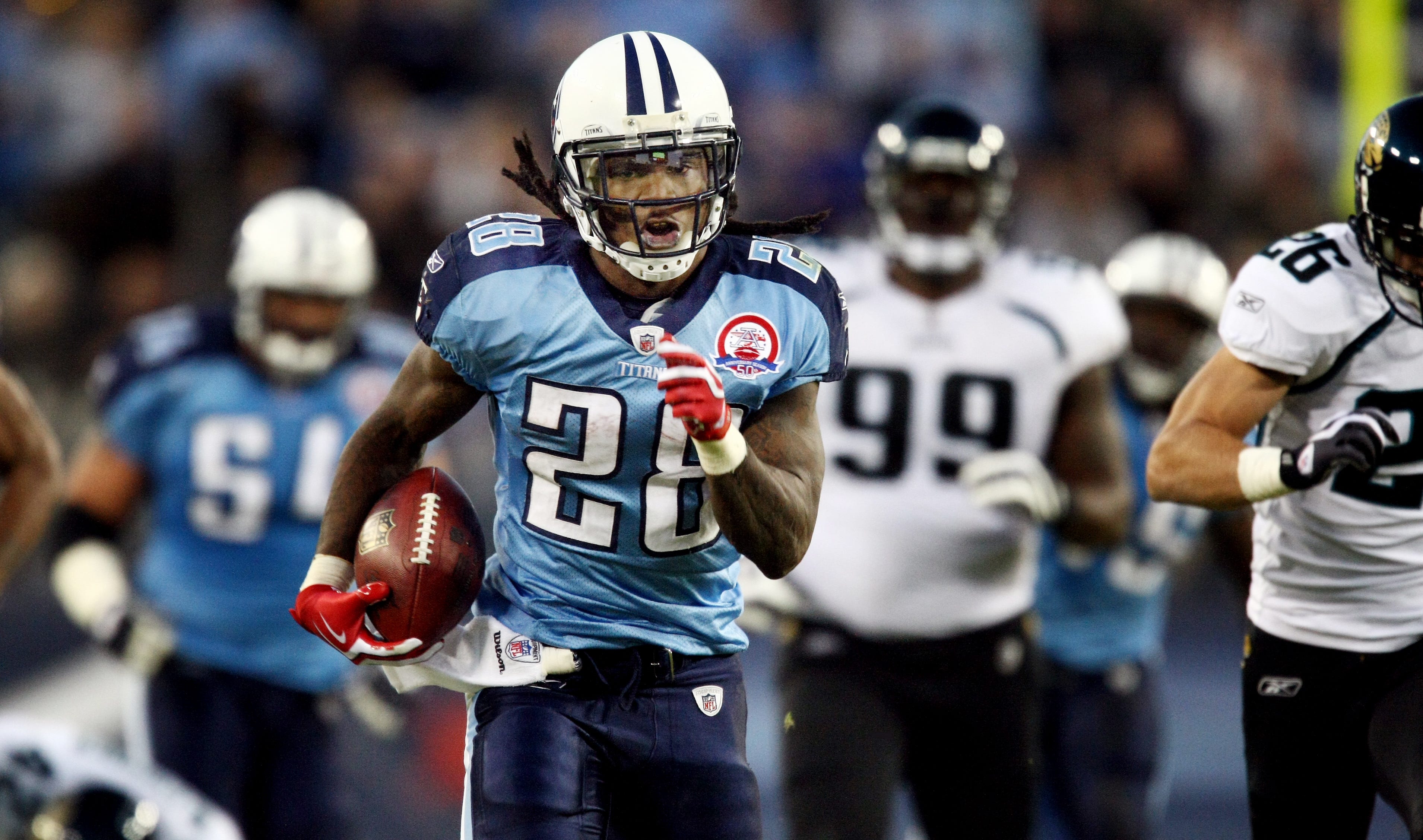 No. 6-Chris Johnson: Tennessee Titans running back Johnson (28) pulls away from Jacksonville Jaguars defense for a 52 yard touchdown run in the third quarter their game at LP Field Nov. 1, 2009. 06 C... George Walker IV / The Tennessean-Imagn Content Services, LLC
