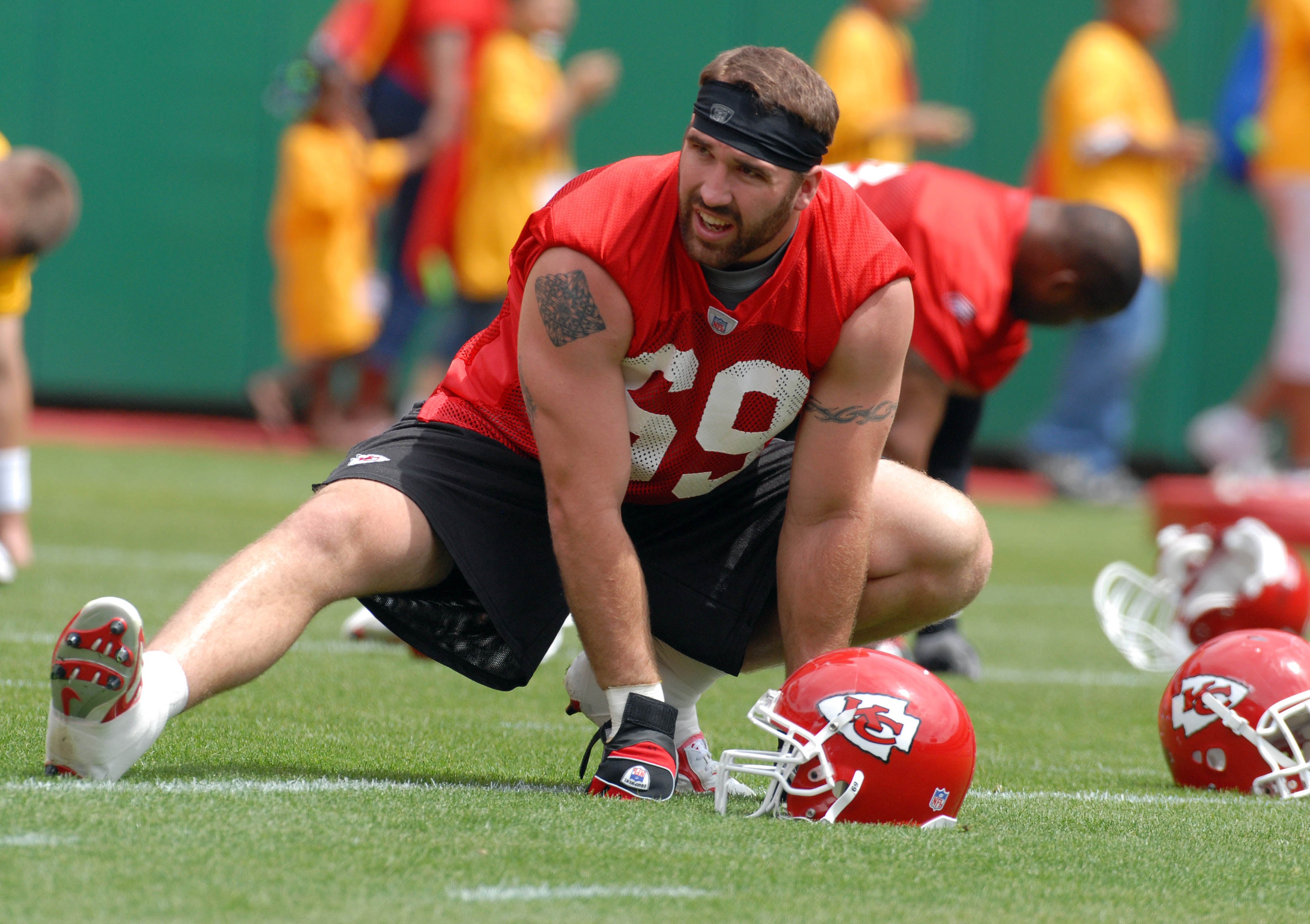 Jun 2, 2007; Kansas City, MO, USA; Kansas City Chiefs defensive end (69) Jared Allen stretches during the Chiefs mini camp at Arrowhead Stadium in Kansas City, MO.