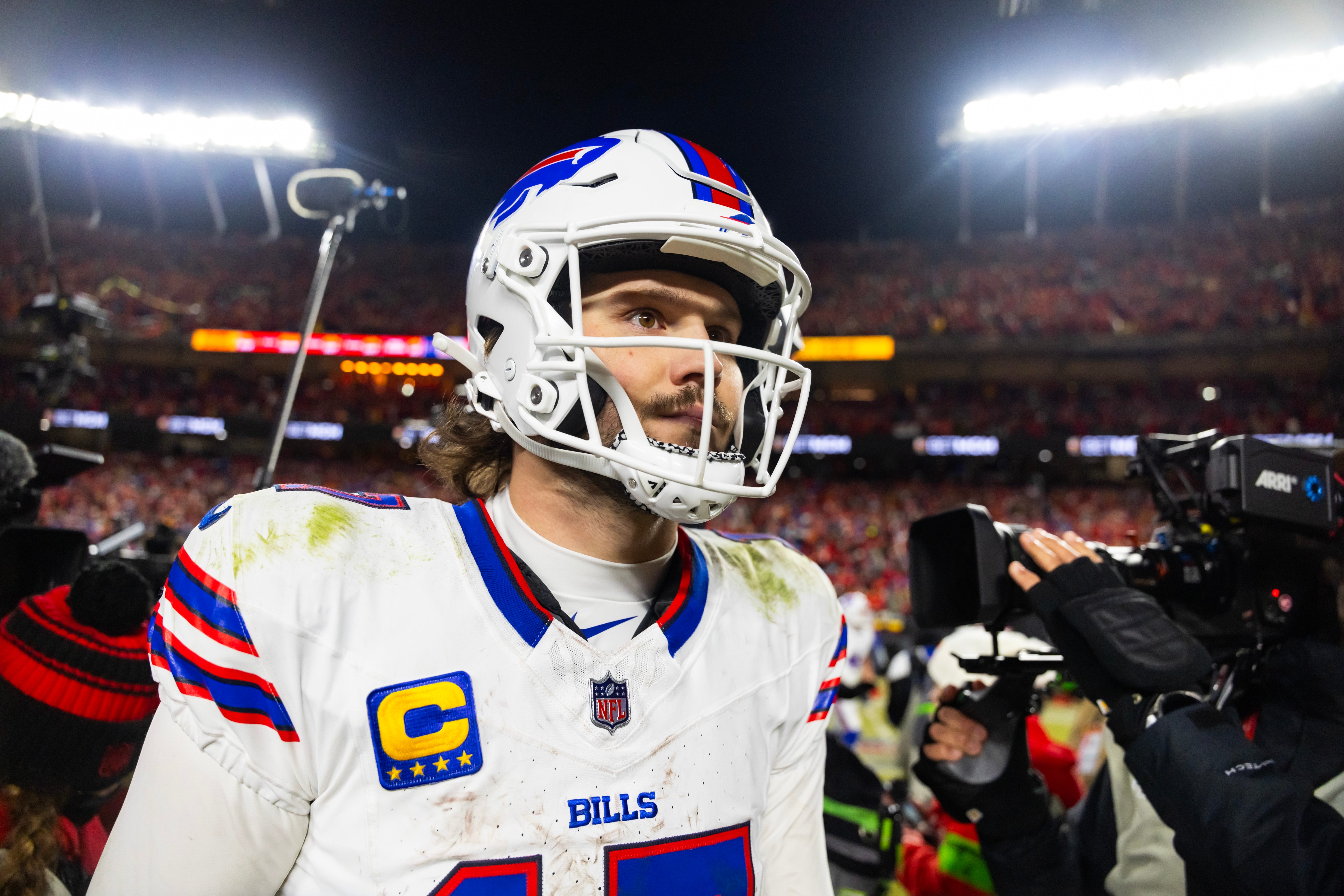 Jan 26, 2025; Kansas City, MO, USA; Buffalo Bills quarterback Josh Allen (17) reacts as he walks off the field after losing to the Kansas City Chiefs during the AFC Championship game at GEHA Field at Arrowhead Stadium.