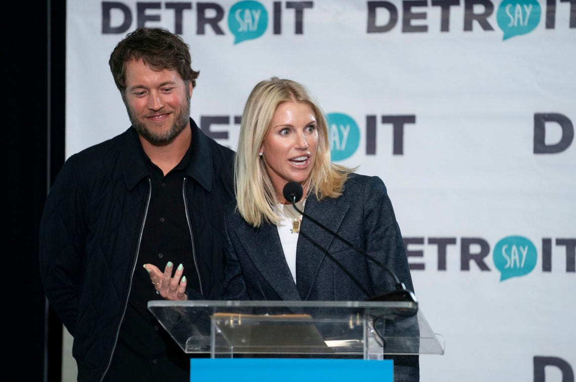 Matthew and Kelly Stafford make remarks before the ribbon cutting for the Kelly and Matthew Stafford and Friends Education Center at the S.A.Y Detroit Play Center in Detroit on Monday, April 1, 2024.