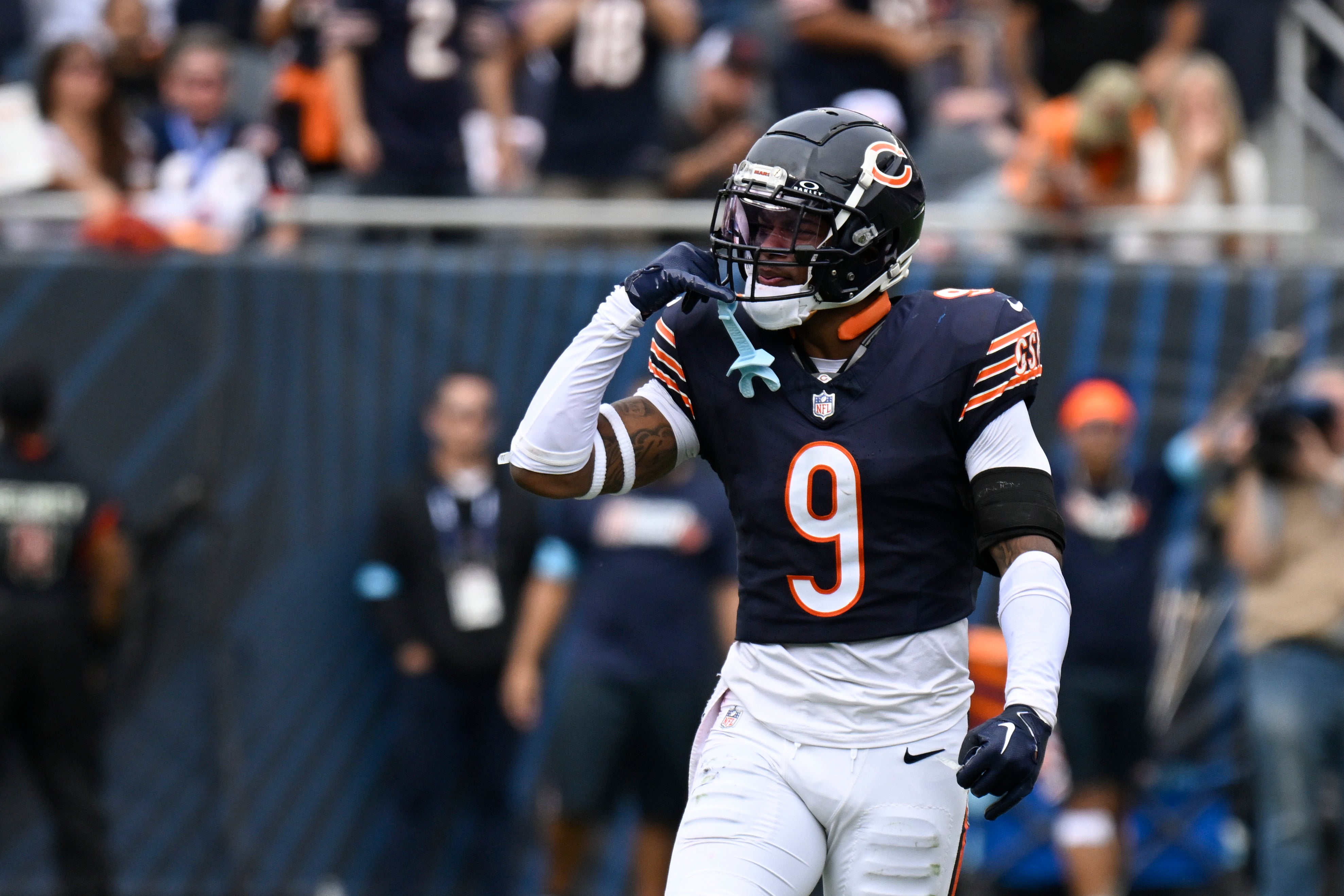 Sep 29, 2024; Chicago, Illinois, USA; Chicago Bears safety Jaquan Brisker (9) after sacking Los Angeles Rams linebacker Jared Verse (8) during the second half at Soldier Field.