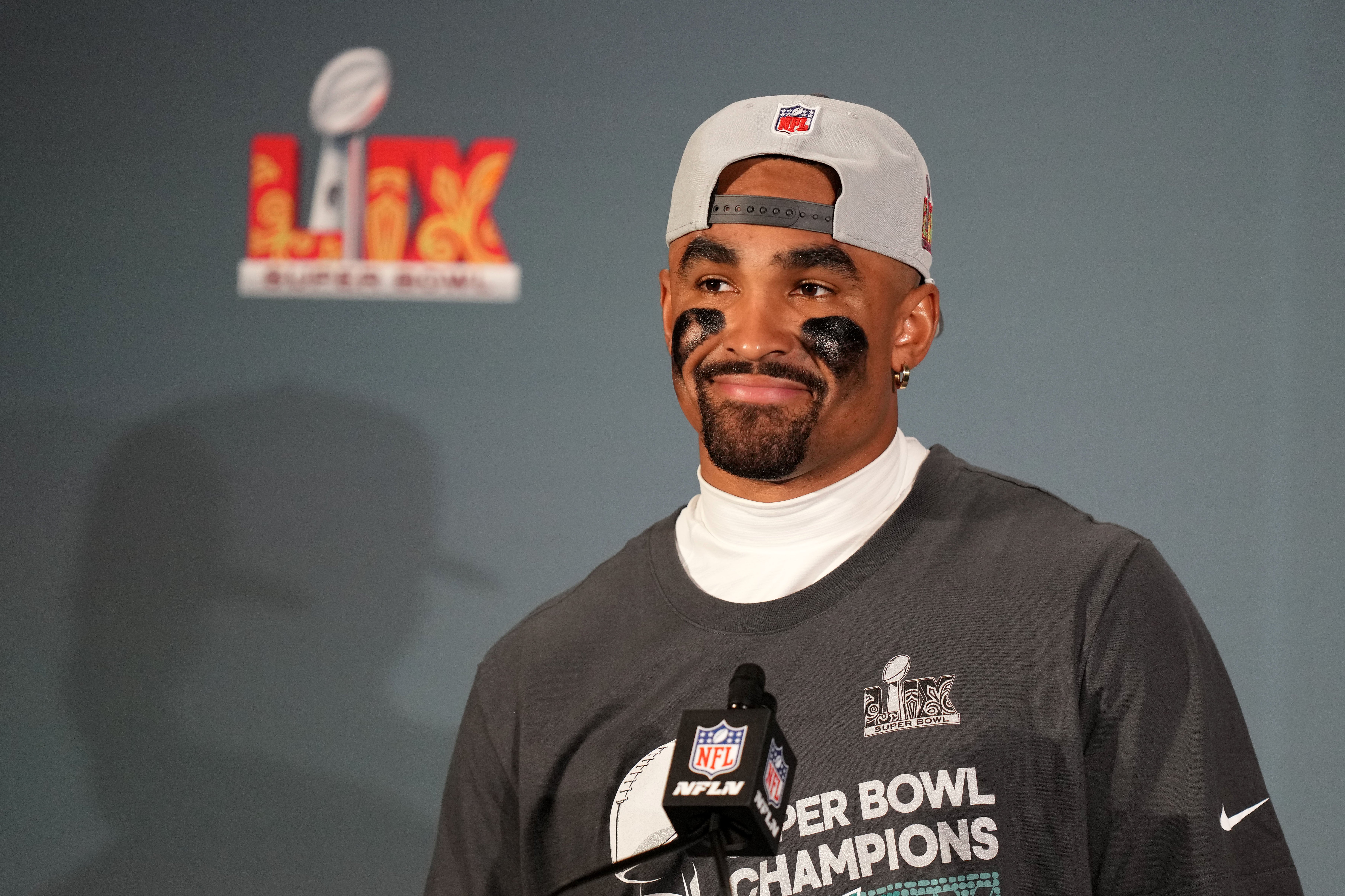 Philadelphia Eagles quarterback Jalen Hurts (1) speaks to the media after defeating the Kansas City Chiefs in Super Bowl LIX at Caesars Superdome.