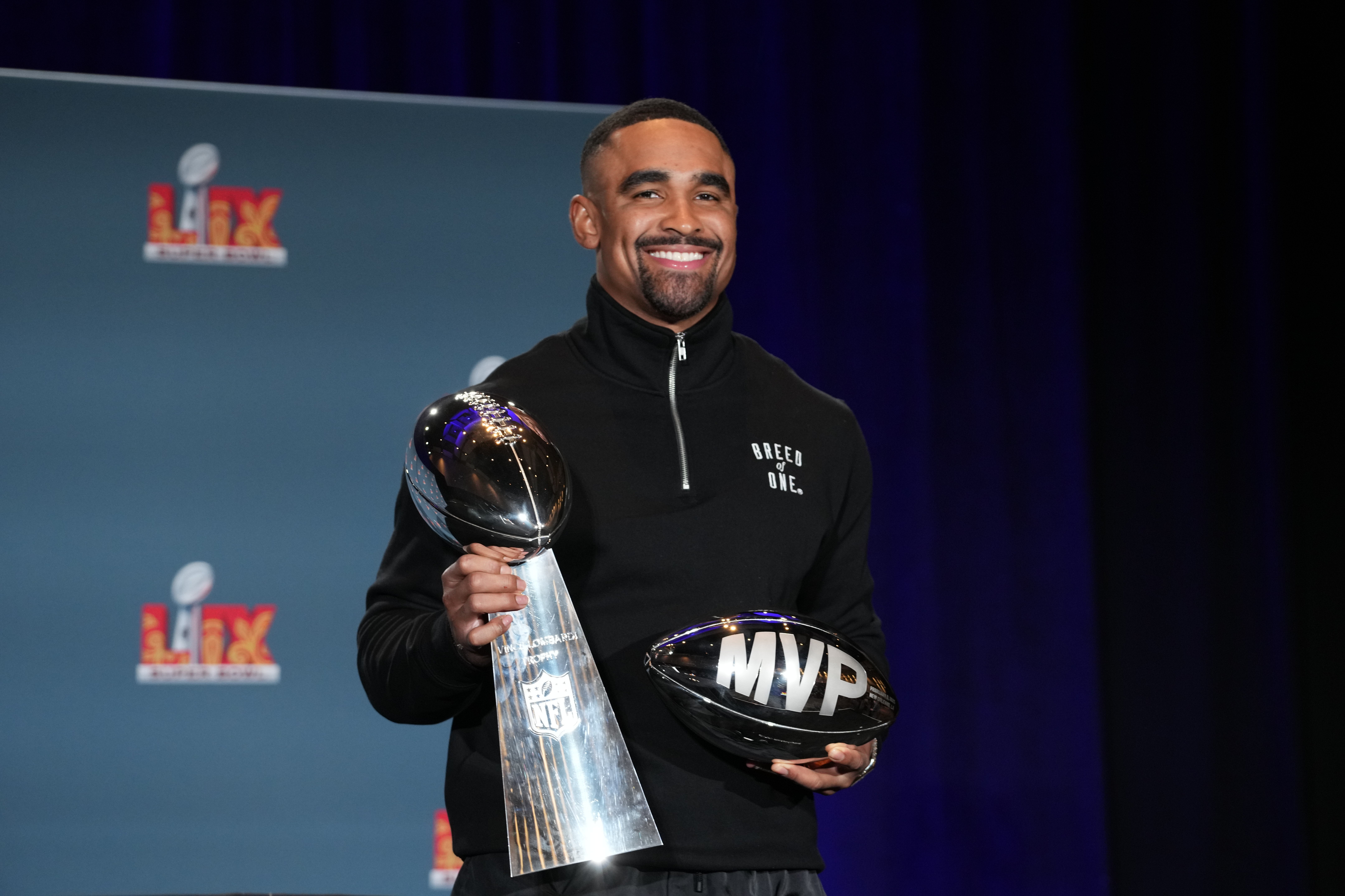 Philadelphia Eagles quarterback Jalen Hurts (1) poses with the Vince Lombardi trophy at the Super Bowl LIX Winning Head Coach and Most Valuable Player press conference at the Ernest N. Morial Conventi... Kirby Lee-Imagn Images