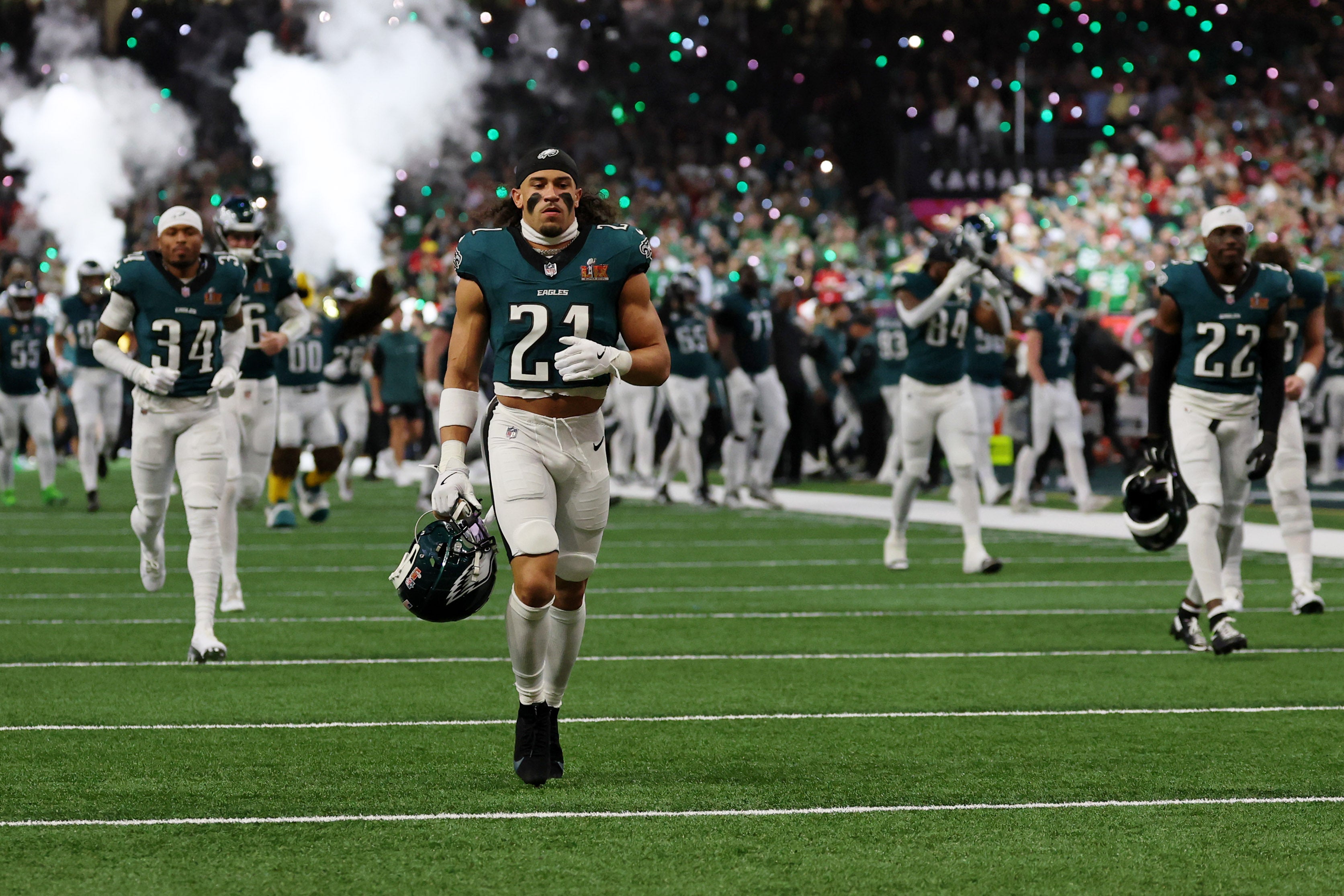 Philadelphia Eagles safety Sydney Brown (21) runs onto the field before Super Bowl LIX between the Philadelphia Eagles and the Kansas City Chiefs at Caesars Superdome.