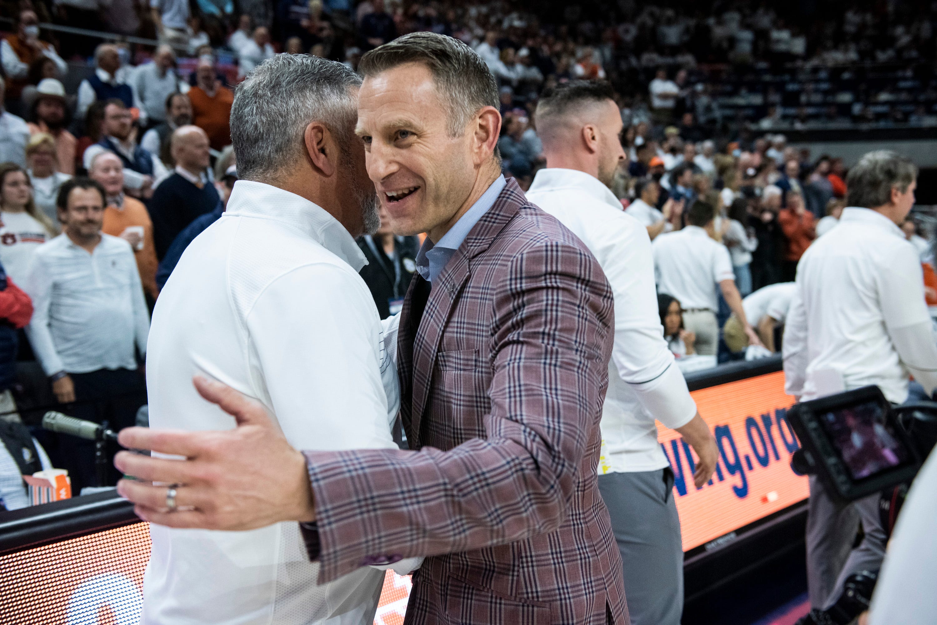 Auburn Tigers head coach Bruce Pearl and Alabama Crimson Tide head coach Nate Oats hug before the game at Auburn Arena in Auburn, Ala., on Tuesday, Feb. 1, 2022. Auburn Tigers lead Alabama Crimson Tide at halftime 51-37.