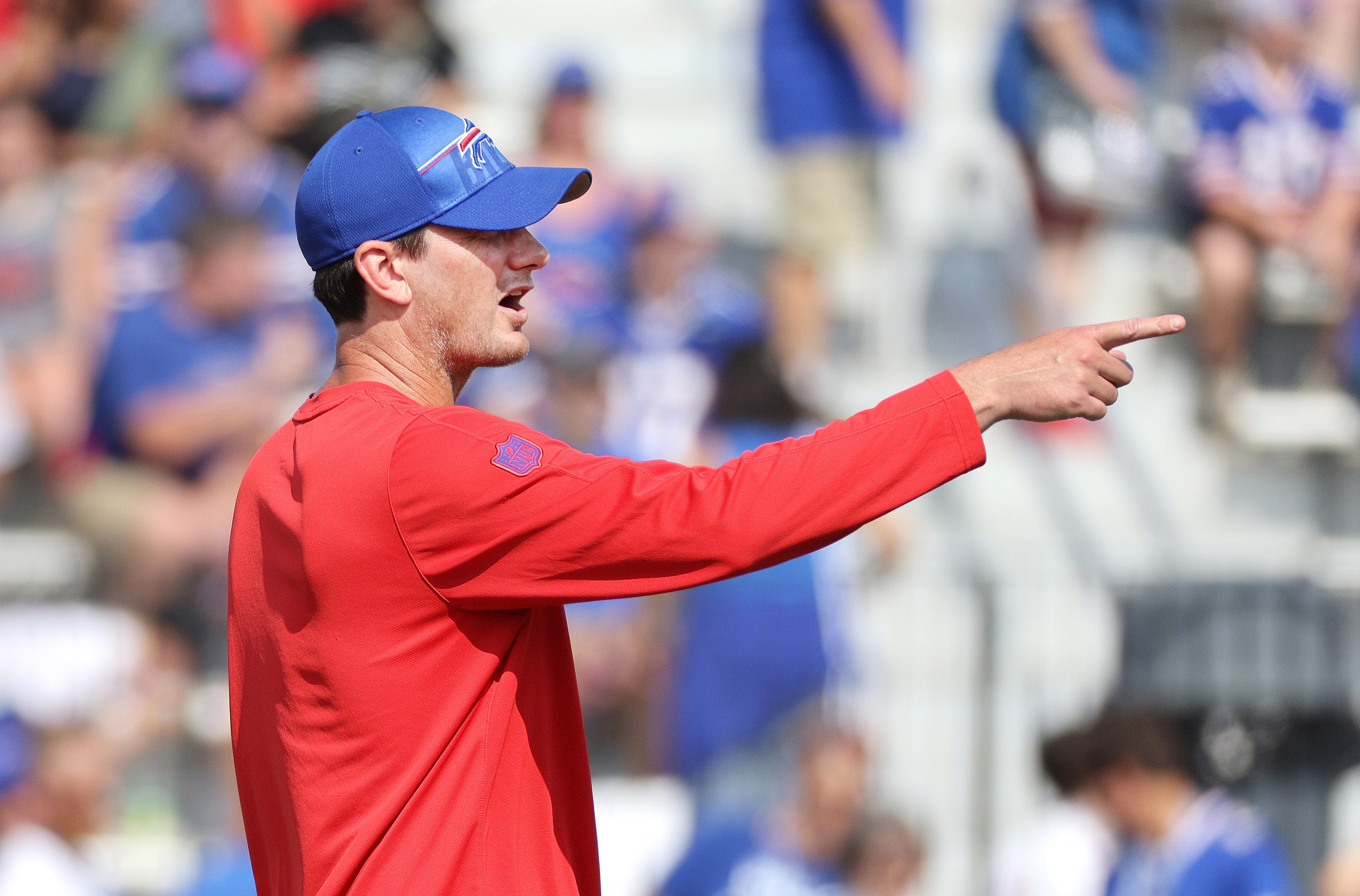 Bills offensive coordinator Ken Dorsey the the play right during practice.