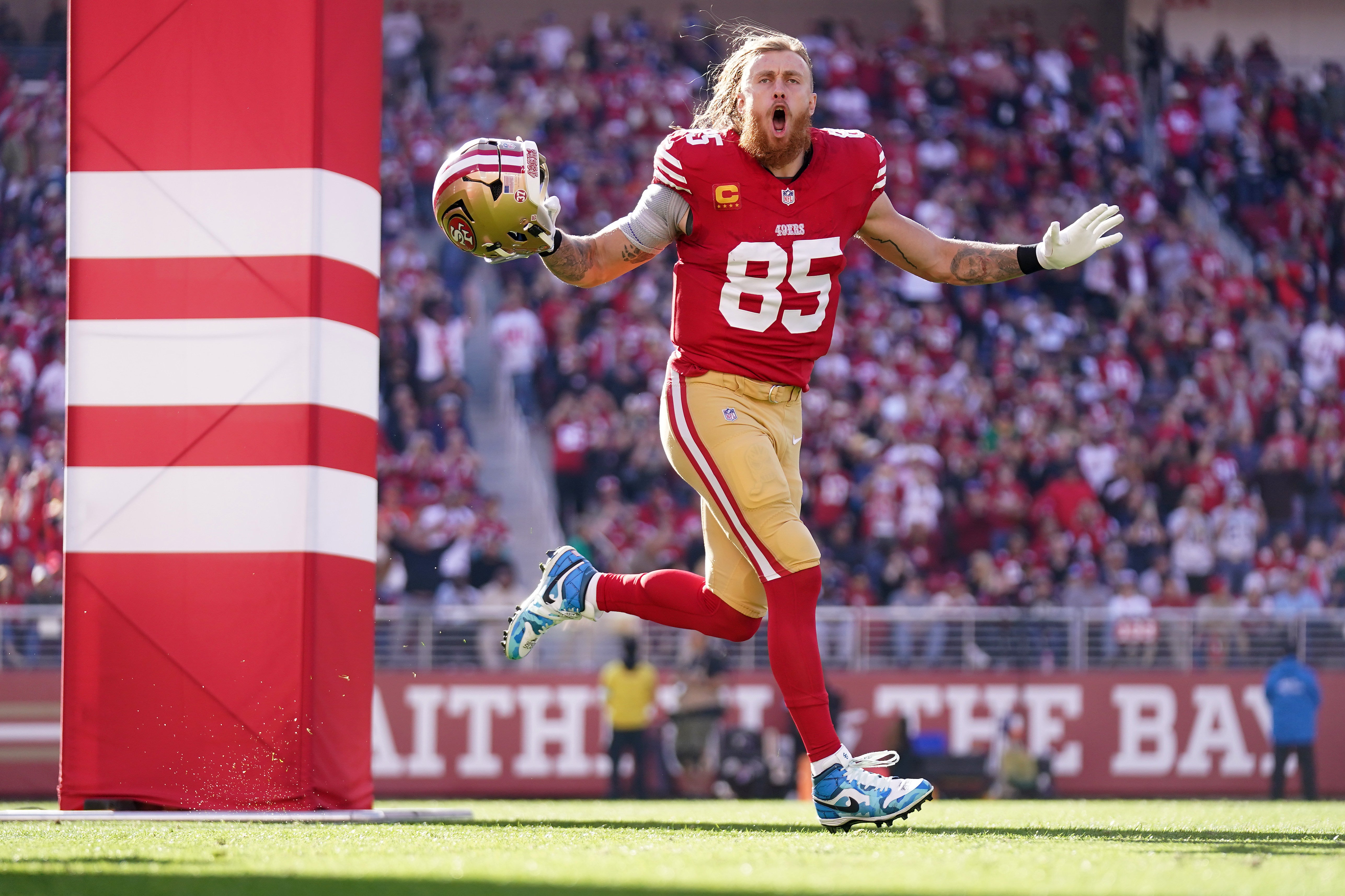 San Francisco 49ers tight end George Kittle (85) is introduced before the start of the game against the Chicago Bears at Levi's Stadium.