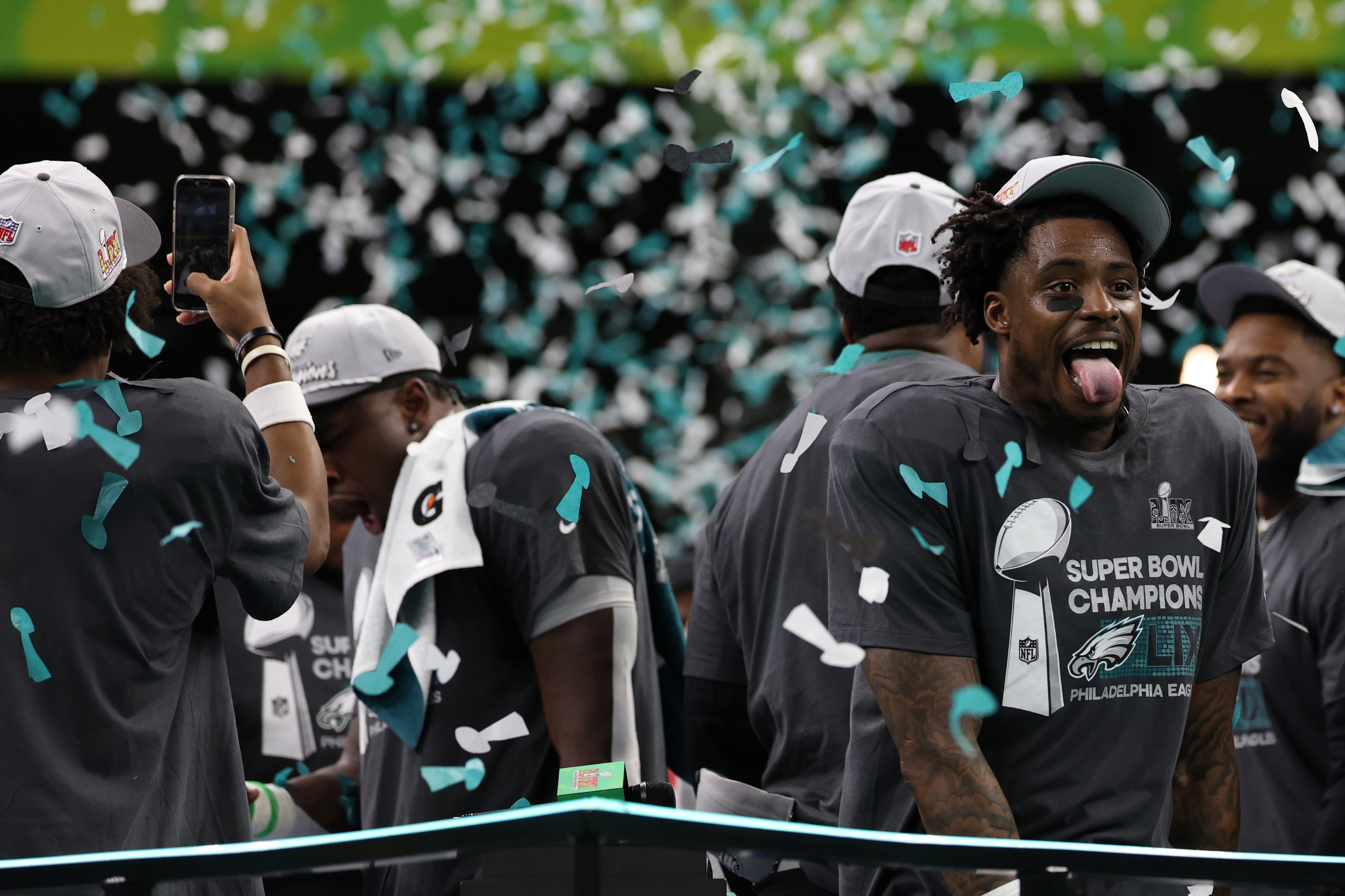 Philadelphia Eagles safety C.J. Gardner-Johnson celebrates on the stage during the championship trophy presentation after the Eagles' game against the Kansas City Chiefs in Super Bowl LIX at Caesars.