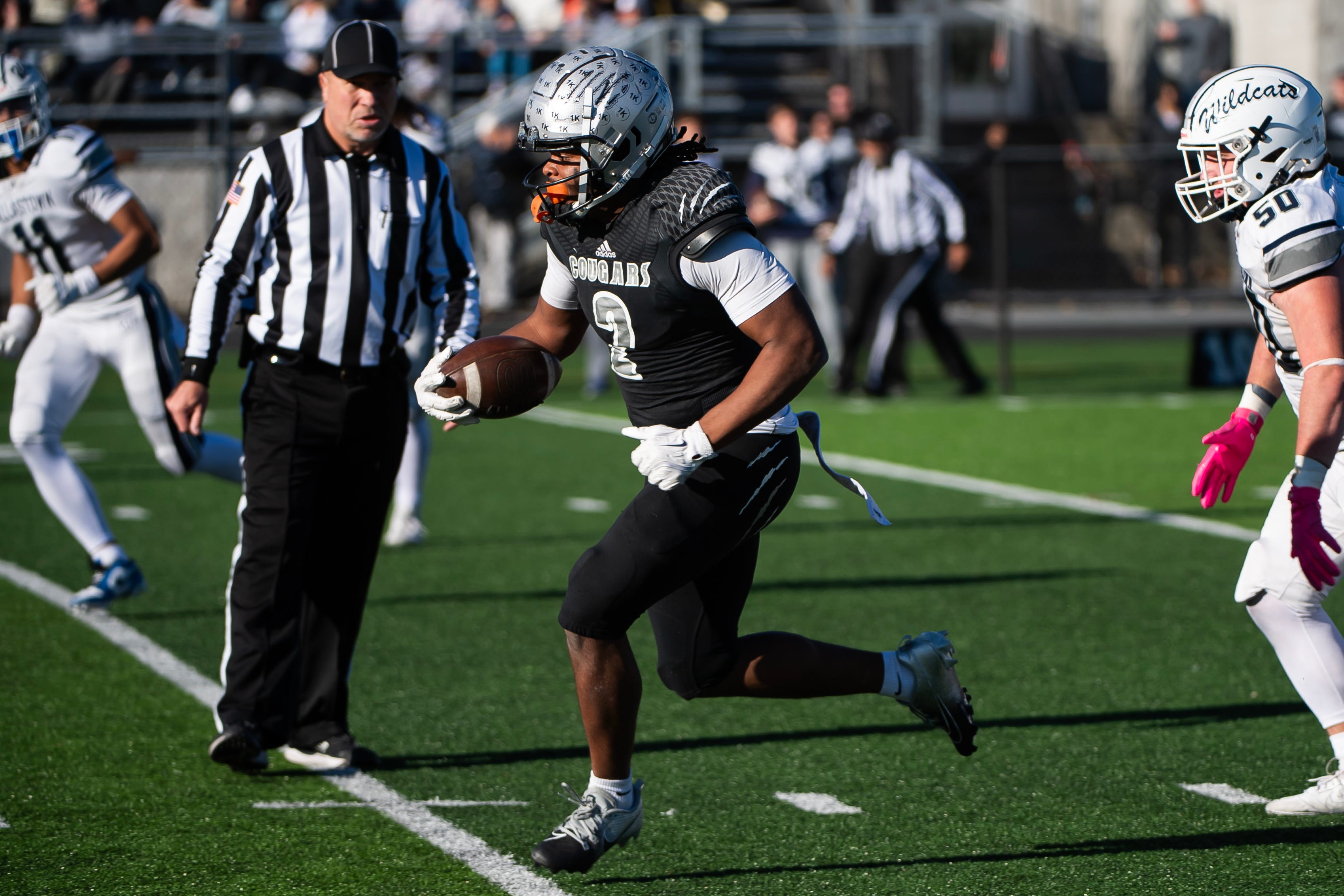 Harrisburg running back Messiah Mickens breaks free on an 89-yard touchdown run in the second half of a District 3 Class 6A quarterfinal game against Dallastown, Saturday, Nov. 9, 2024, at Severance Field in Harrisburg.