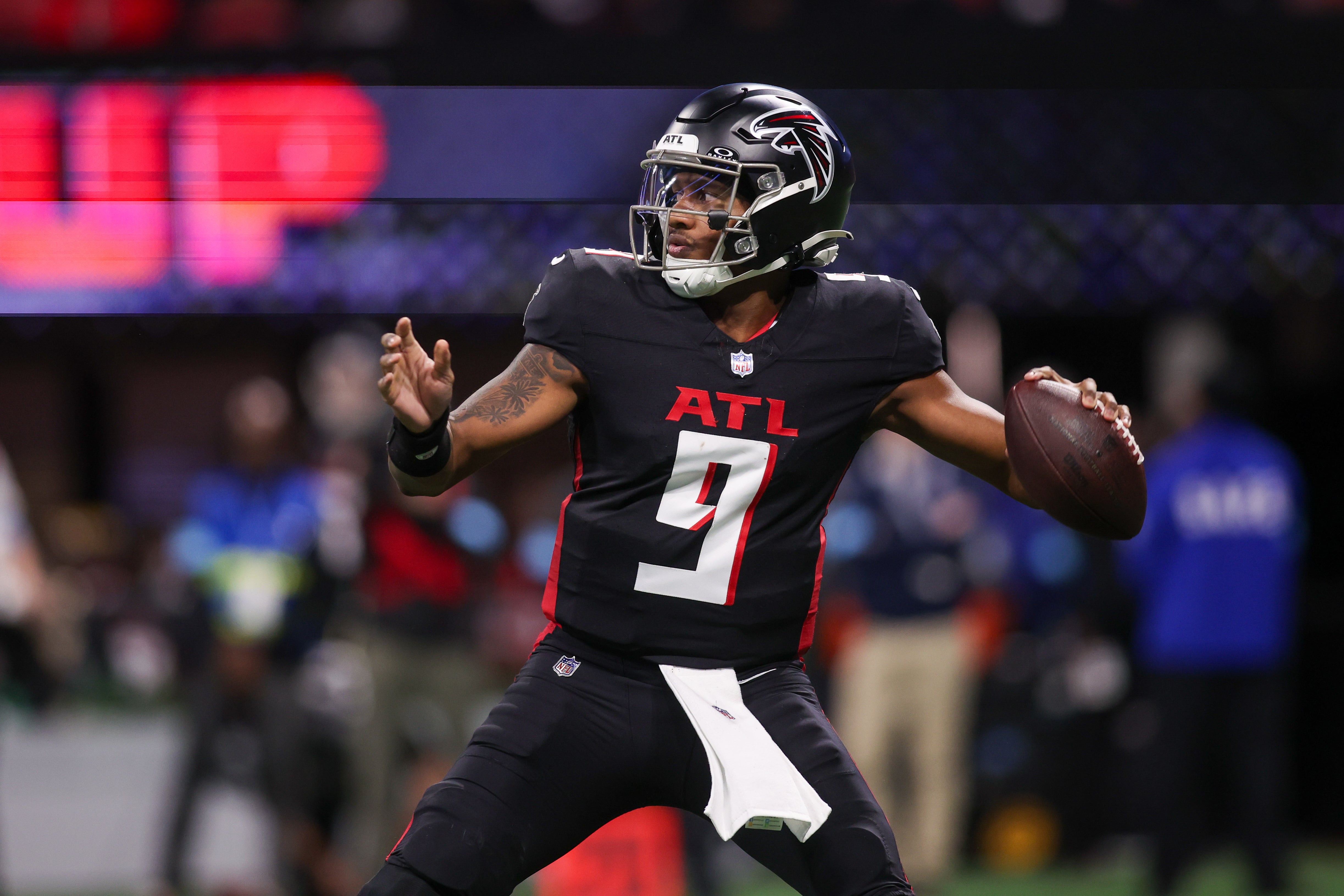 Jan 5, 2025; Atlanta, Georgia, USA; Atlanta Falcons quarterback Michael Penix Jr. (9) throws a pass against the Carolina Panthers in the third quarter at Mercedes-Benz Stadium.