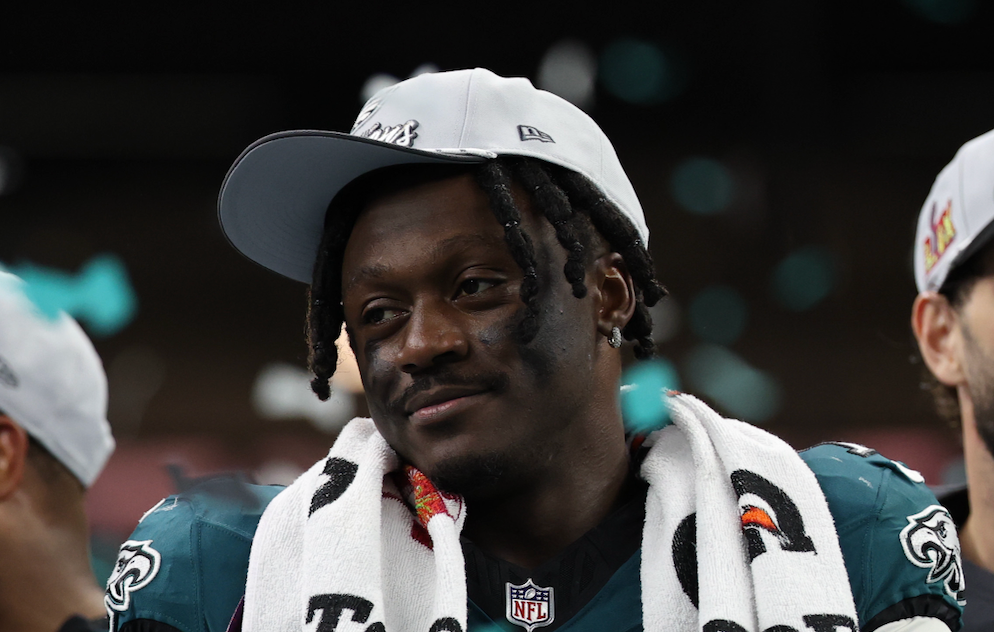 Feb 9, 2025; New Orleans, LA, USA; Philadelphia Eagles wide receiver A.J. Brown (L) stands on the stage during the championship trophy presentation after the Eagles' game against the Kansas City Chiefs in Super Bowl LIX at Caesars Superdome.