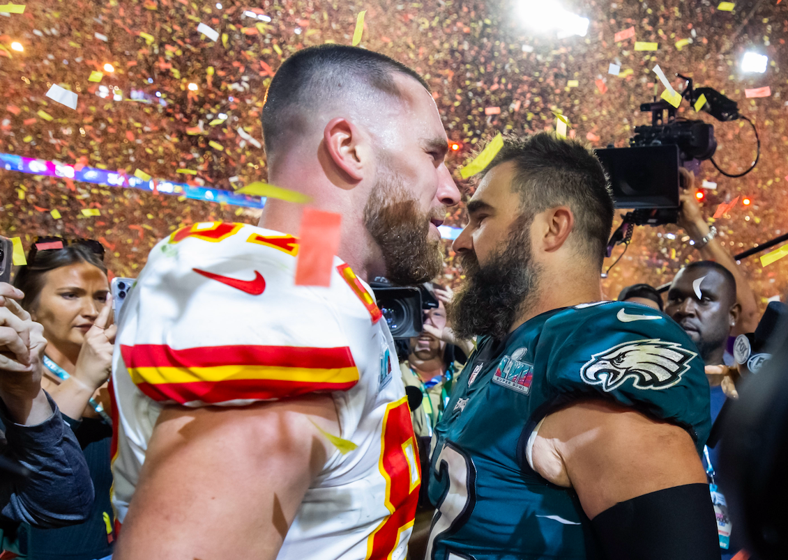 Feb 12, 2023; Glendale, Arizona, US; Kansas City Chiefs tight end Travis Kelce (87) talks with his brother Philadelphia Eagles center Jason Kelce (62) after Super Bowl LVII at State Farm Stadium.