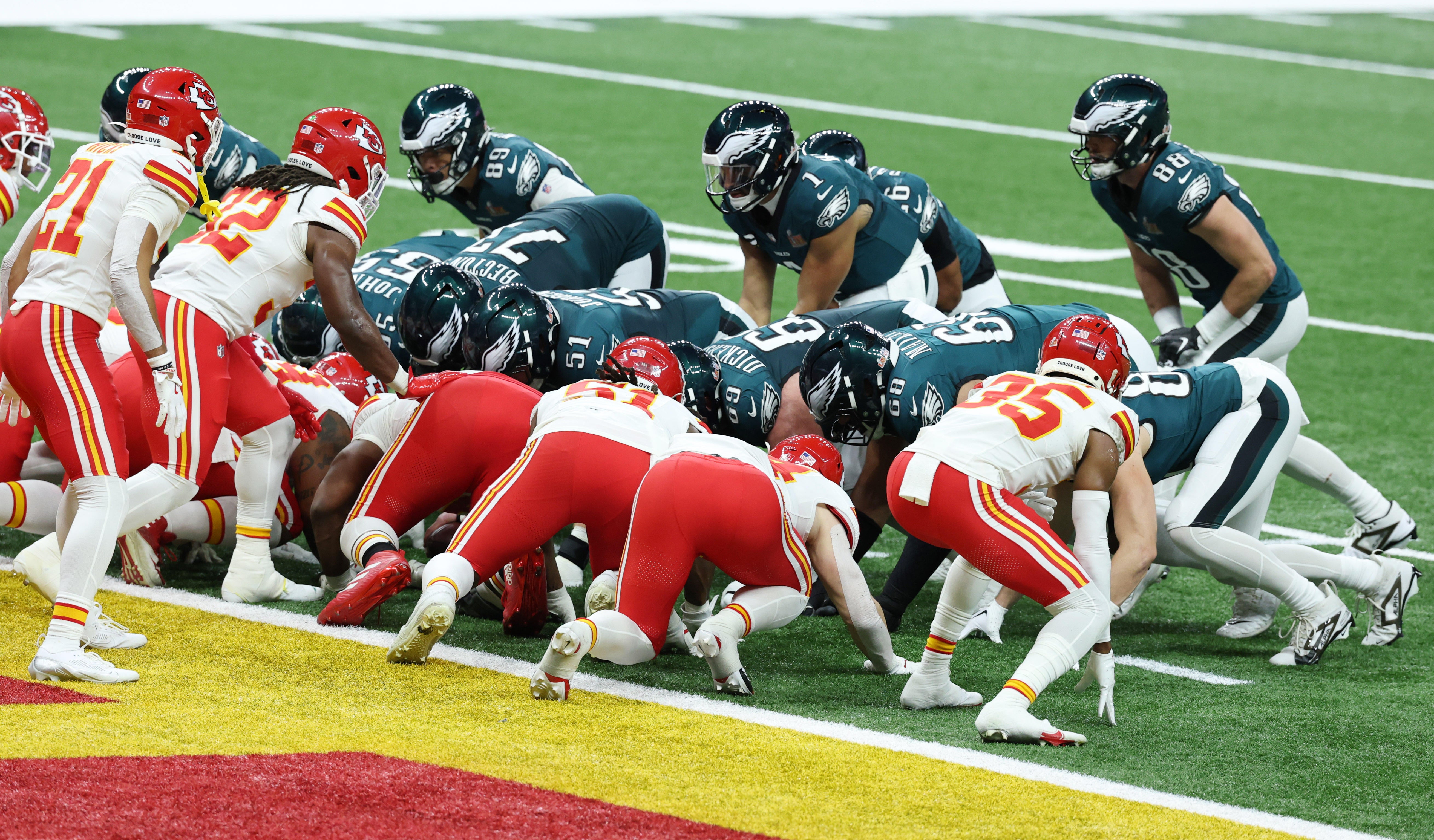 Philadelphia Eagles quarterback Jalen Hurts (1) prepares to take the snap before running in for a touchdown against the Kansas City Chiefs in the first quarter in Super Bowl LIX at Ceasars Superdome.