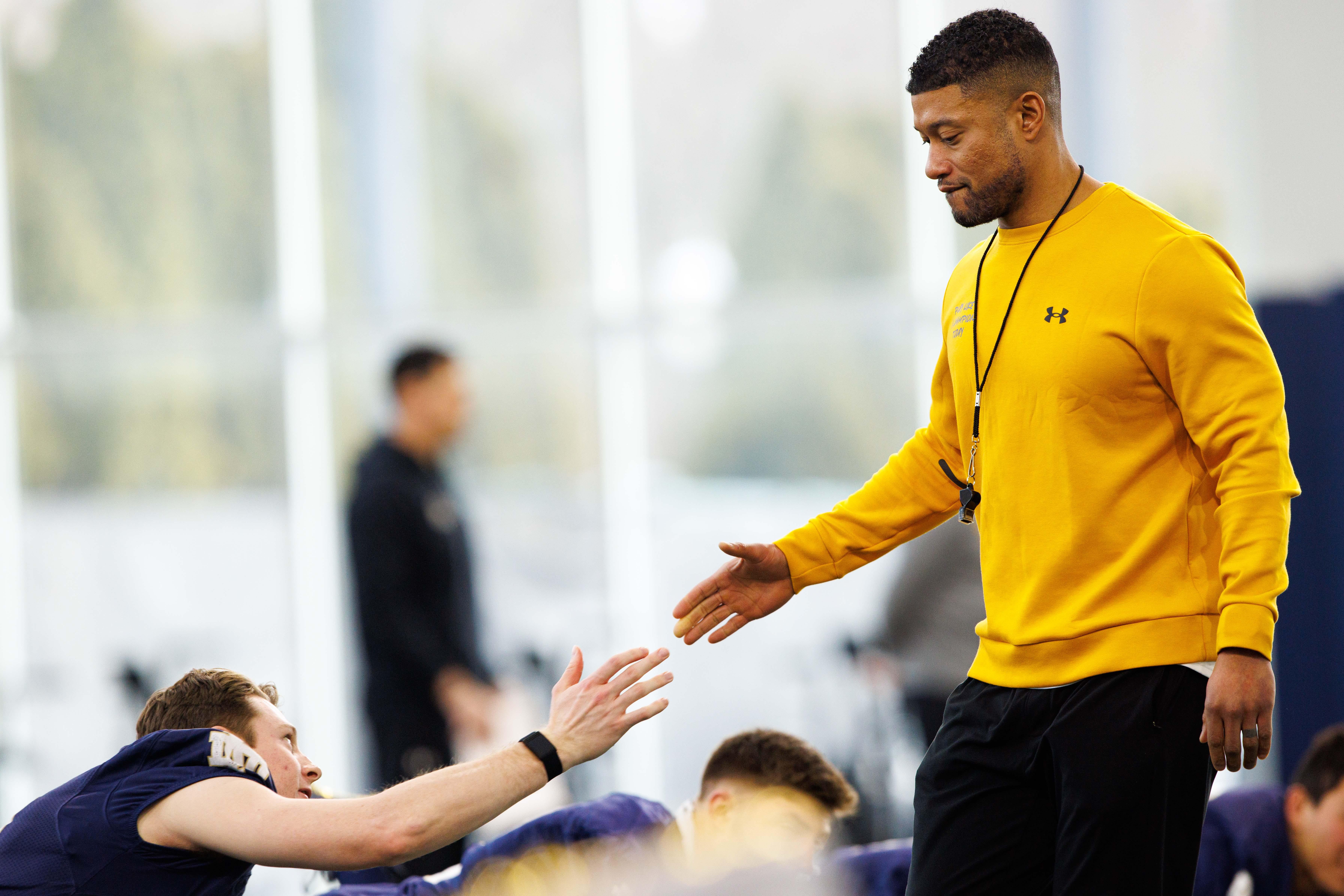 Notre Dame head coach Marcus Freeman greets his team during a Notre Dame football practice at Irish Athletic Center on Sunday, Jan. 5, 2025, in South Bend.