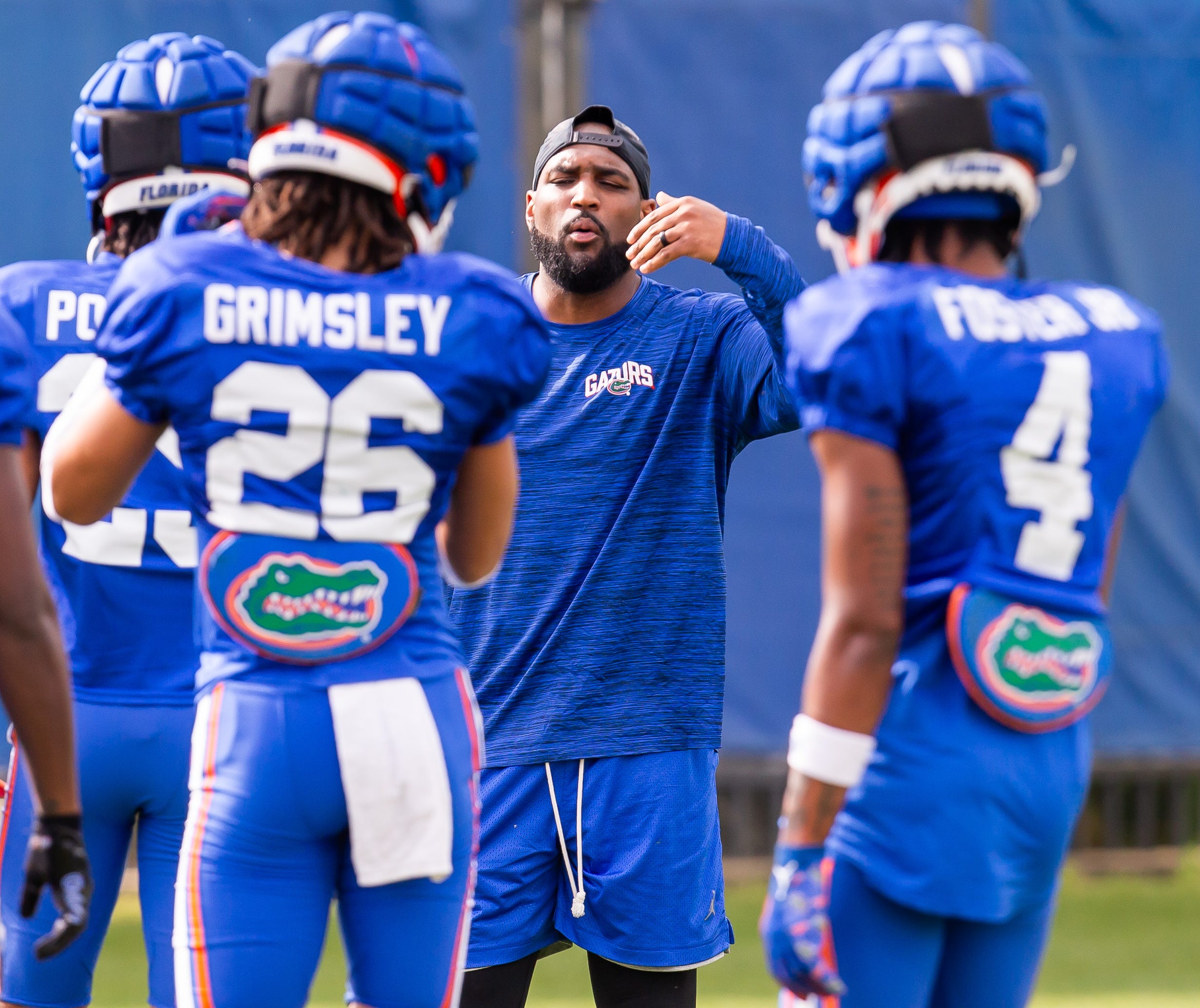 New Florida secondary coach Will Harris directs his defensive backs during the Florida Gators as they held their final open Spring football practice before the Orange and Blue Game at Sanders Practice Fields in Gainesville, FL on Tuesday, April 9, 2024.