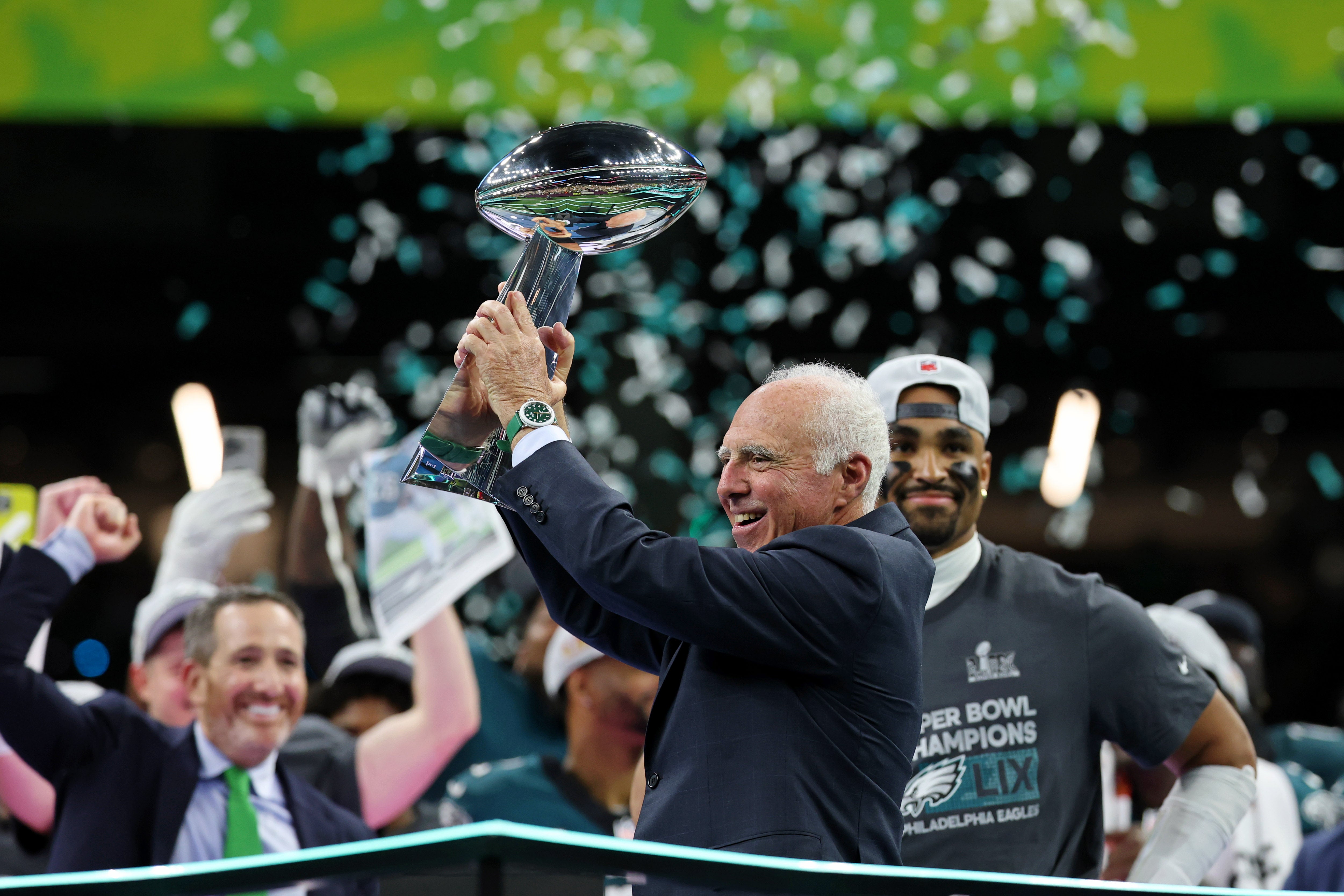 Philadelphia Eagles general manager Howie Roseman holds up the Vince Lombardi Trophy as he celebrates after winning against Kansas City Chiefs in Super Bowl LIX at Caesars Superdome.