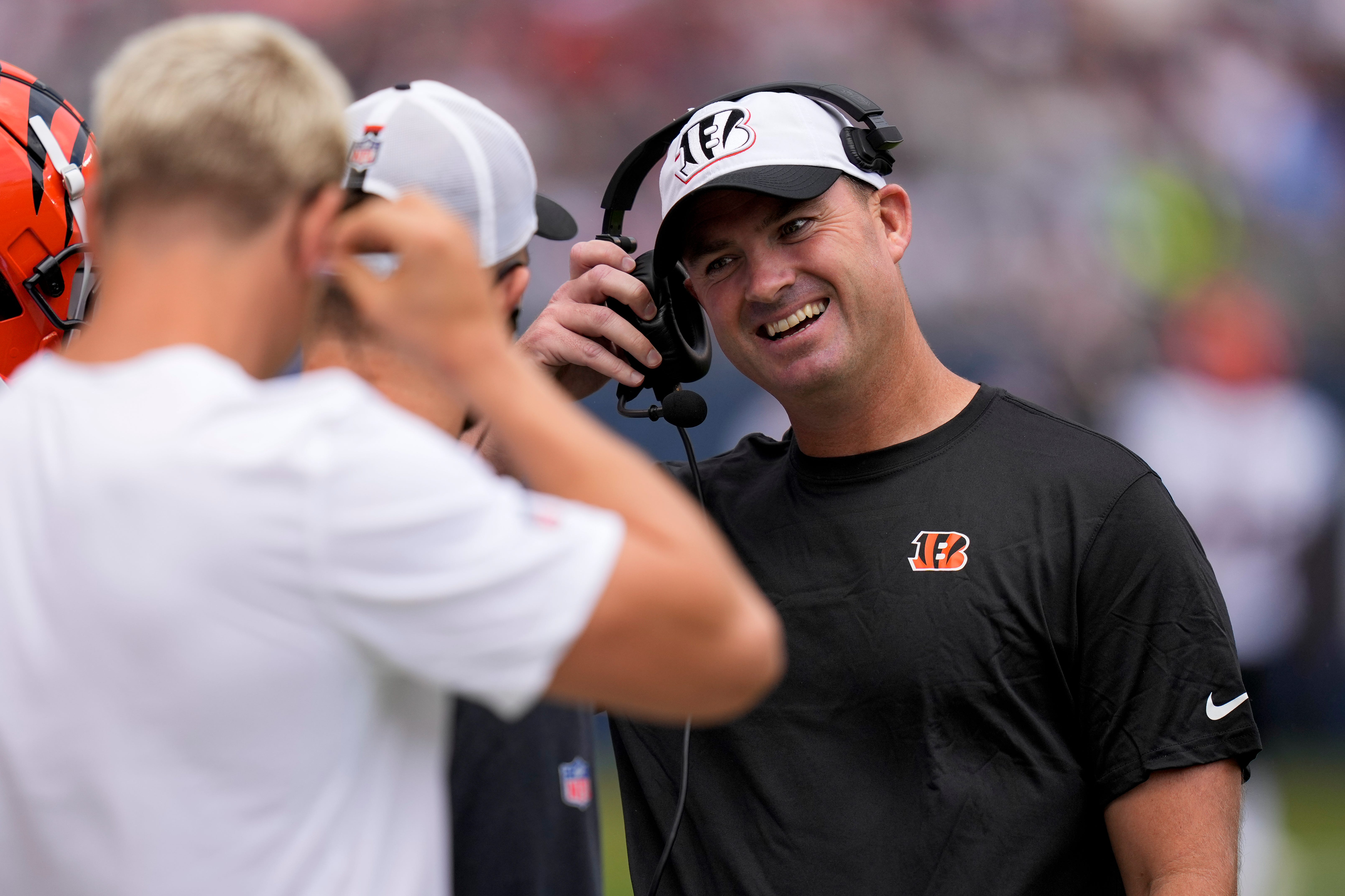 Cincinnati Bengals head coach Zac Taylor smiles after the defense forces a three-and-out on the opening drive of the first quarter of the NFL Preseason Week 2 game between the Chicago Bears and the Cincinnati Bengals at Soldier Field in downtown Chicago on Saturday, Aug. 17, 2024. The Bears led 10-3 at halftime.