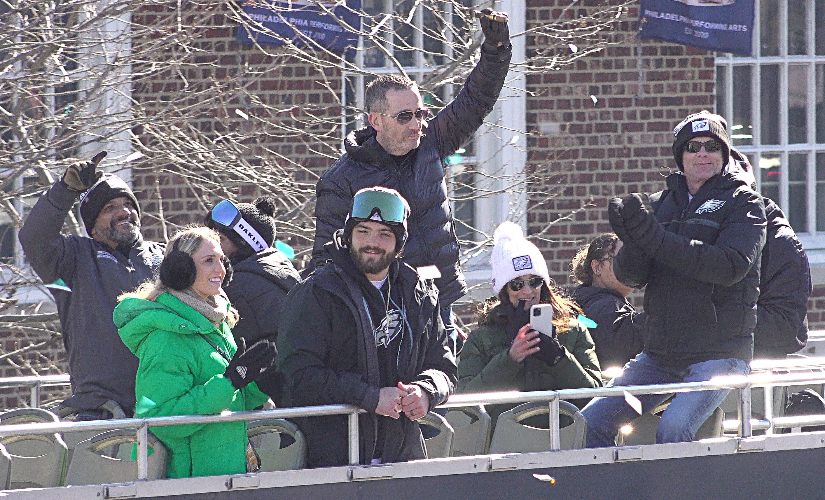 Eagles General Manager Howie Roseman (center) holds a cigar high in the air during the team's Super Bowl championship parade on Friday February 14, 2025.