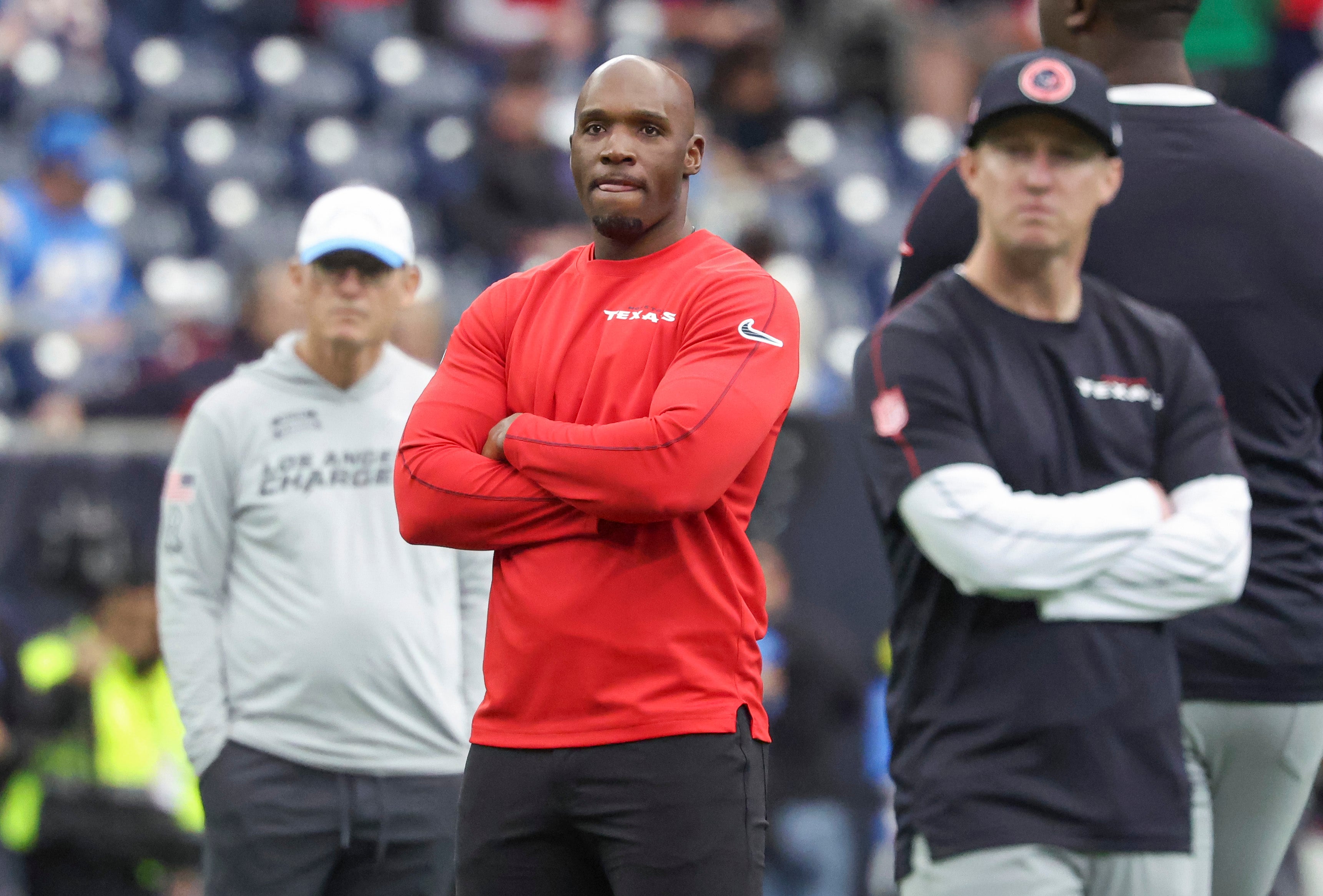 Jan 11, 2025; Houston, Texas, USA; Houston Texans head coach DeMeco Ryans and offensive coordinator Bobby Slowik look on from the field before the game against the Los Angeles Chargers in an AFC wild card game at NRG Stadium.