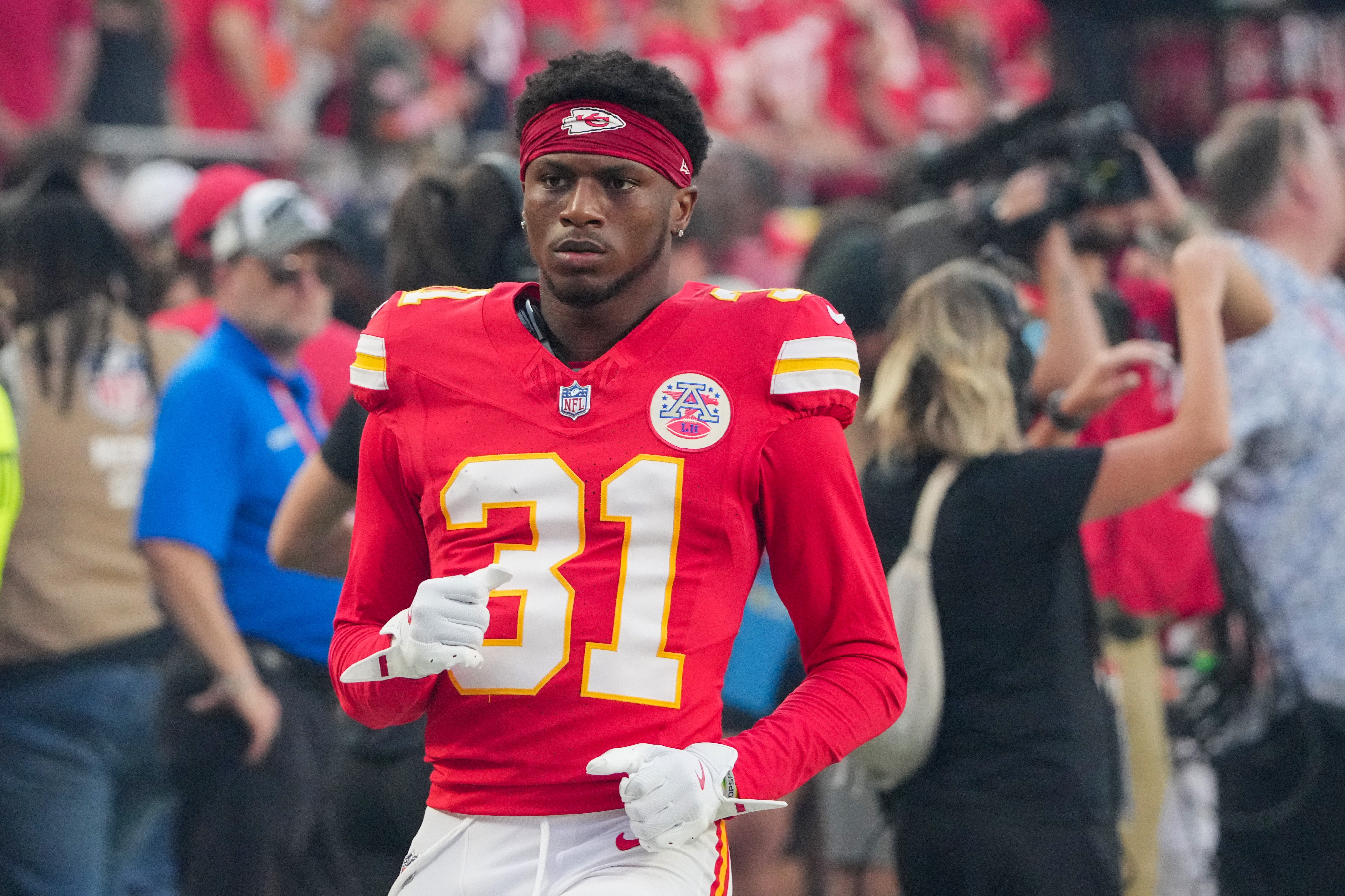 Aug 22, 2024; Kansas City, Missouri, USA; Kansas City Chiefs cornerback Nic Jones (31) runs on field against the Chicago Bears prior to a game at GEHA Field at Arrowhead Stadium.