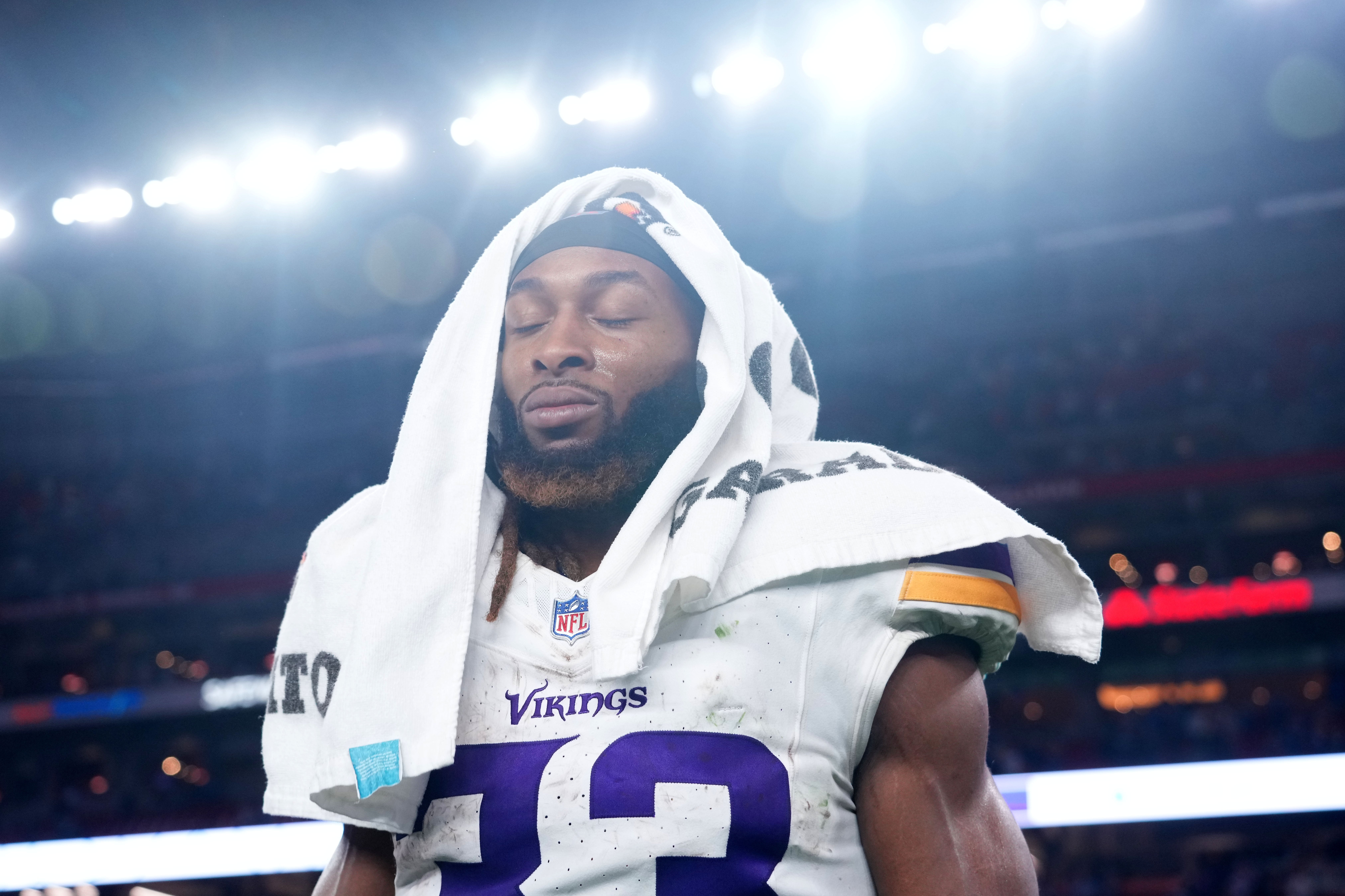 Jan 13, 2025; Glendale, AZ, USA; Minnesota Vikings running back Aaron Jones (33) reacts after the NFC wild card game against the Los Angeles Rams at State Farm Stadium.