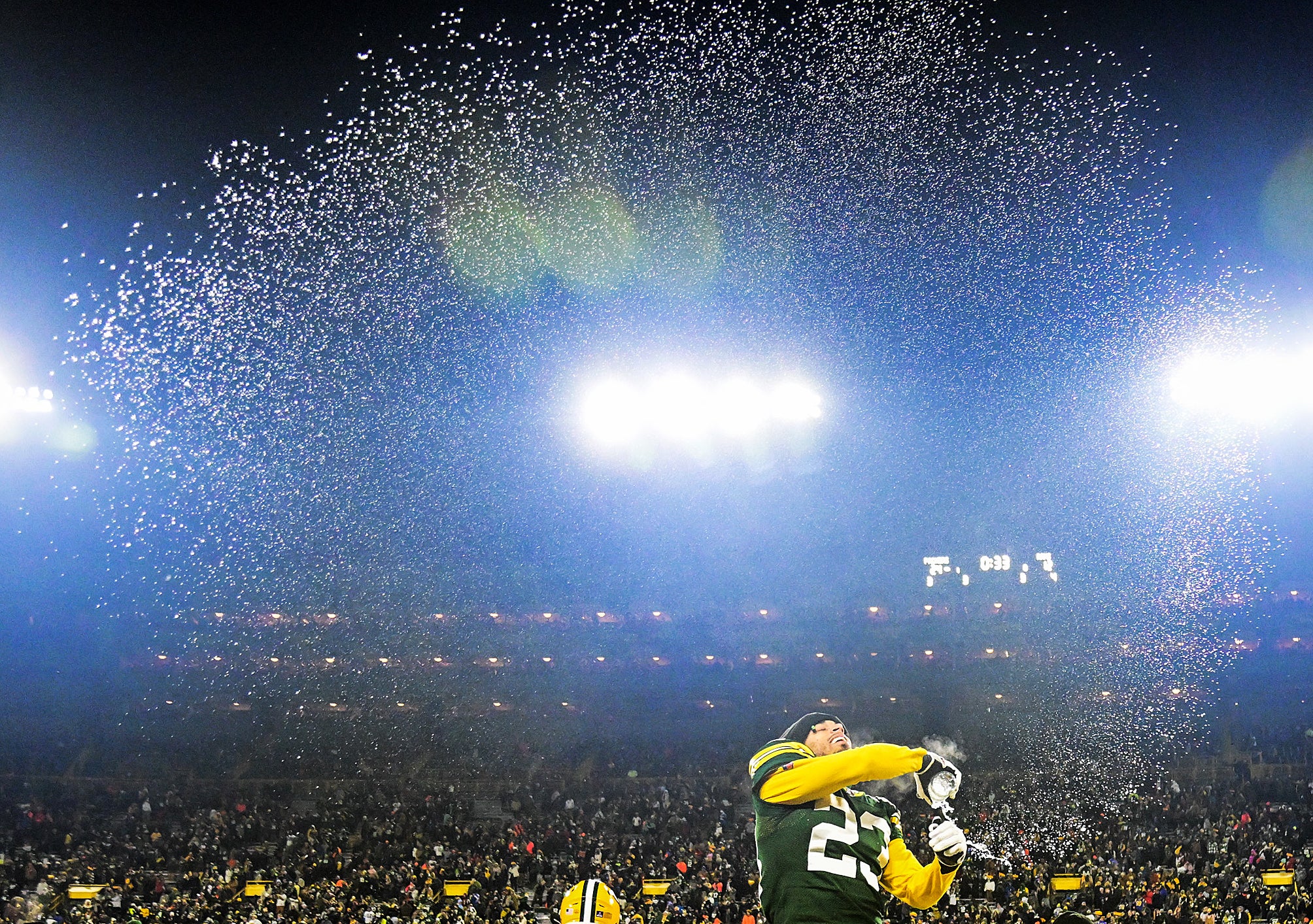 Green Bay Packers corner back Jaire Alexander (23) celebrates after the Packers defeated the Los Angeles Rams at Lambeau Field.