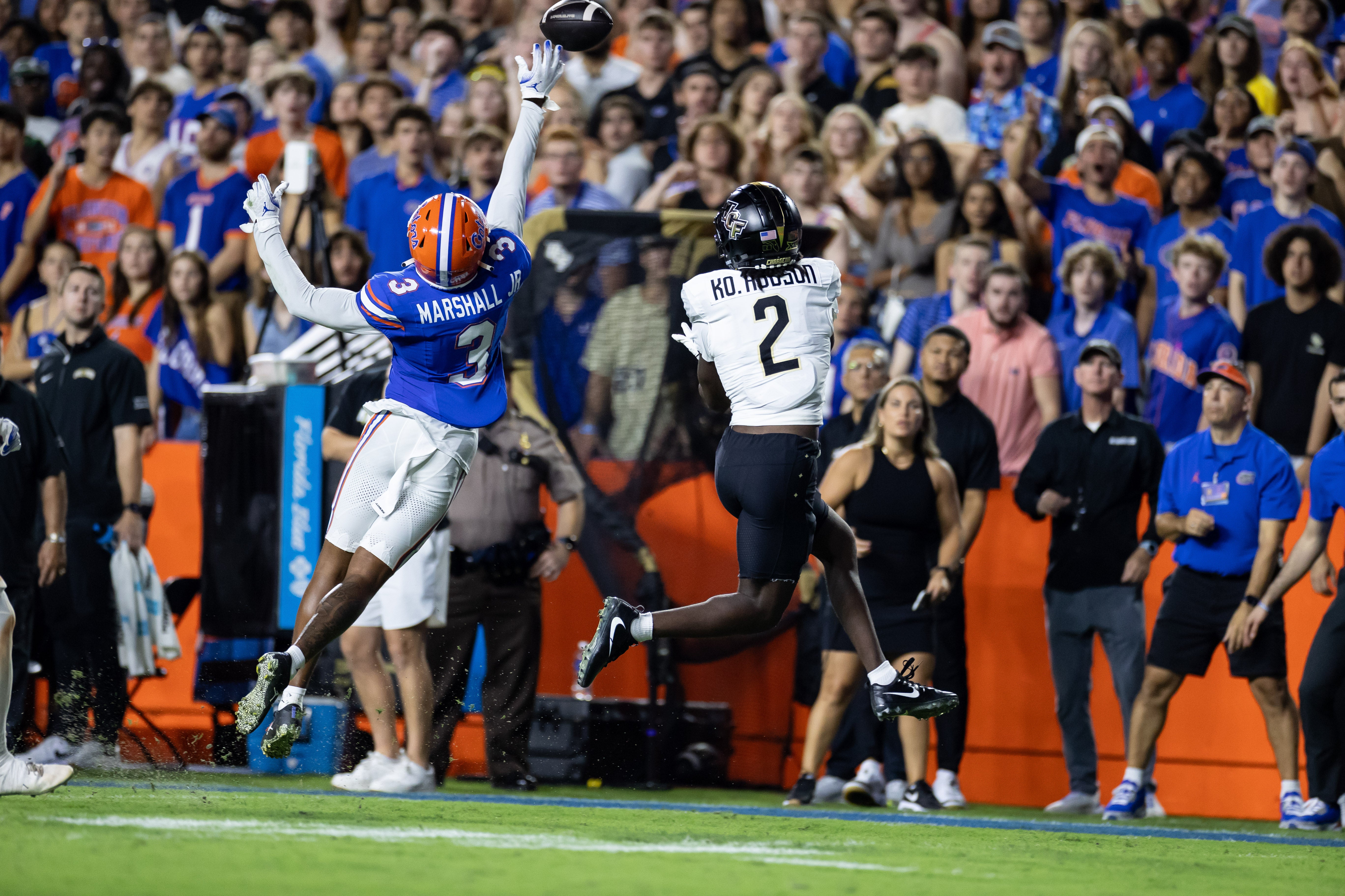 Oct 5, 2024; Gainesville, Florida, USA; Florida Gators defensive back Jason Marshall Jr. (3) breaks up a pass to UCF Knights wide receiver Kobe Hudson (2) during the first half at Ben Hill Griffin Stadium.