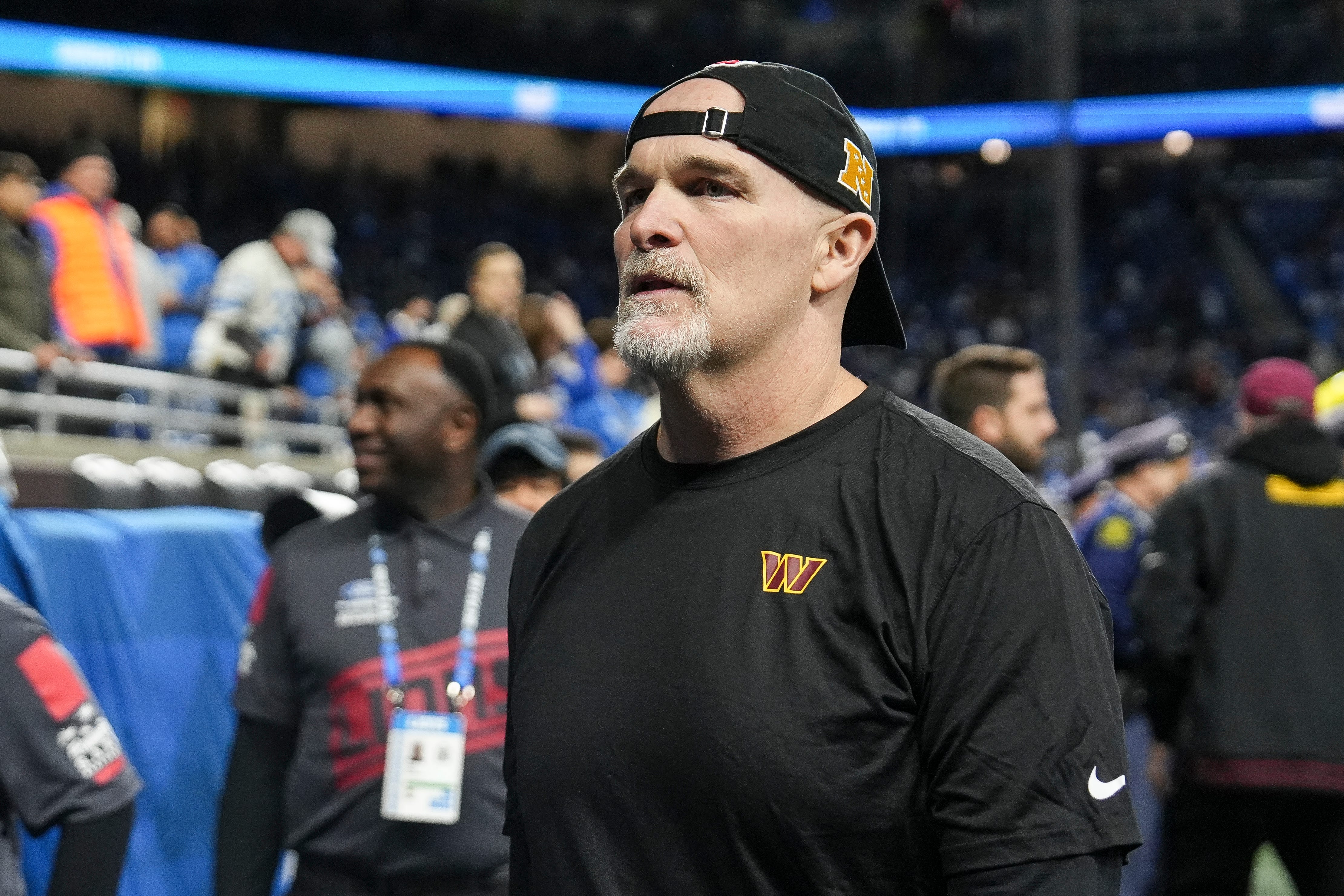 Washington Commanders head coach Dan Quinn walks up the tunnel during warm up before the NFC divisional round between Detroit Lions and Washington Commanders at Ford Field in Detroit on Saturday, Jan. 18, 2025.