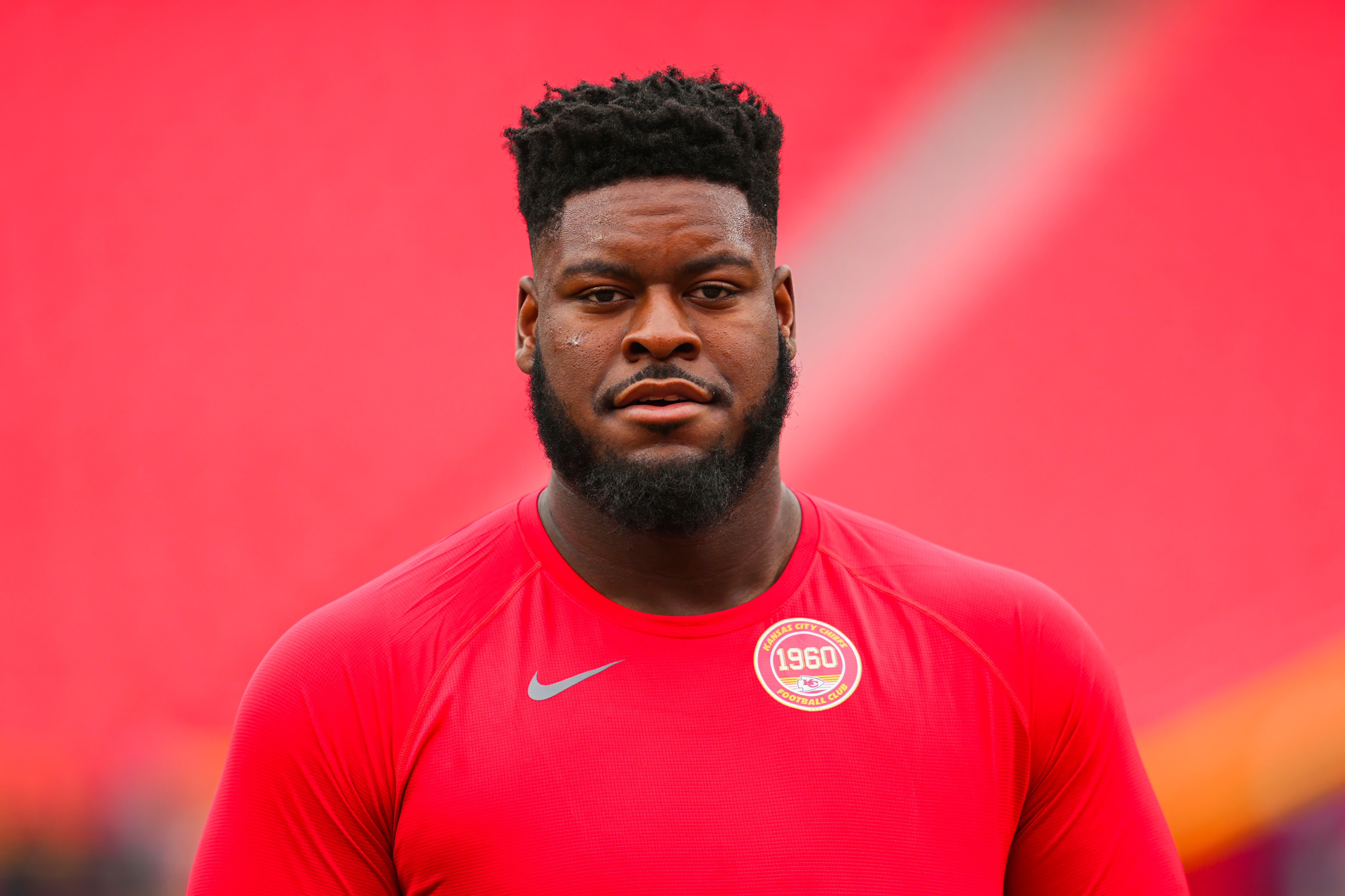 Aug 22, 2024; Kansas City, Missouri, USA; Kansas City Chiefs guard Trey Smith (65) warms up prior to a game against the Chicago Bears at GEHA Field at Arrowhead Stadium.
