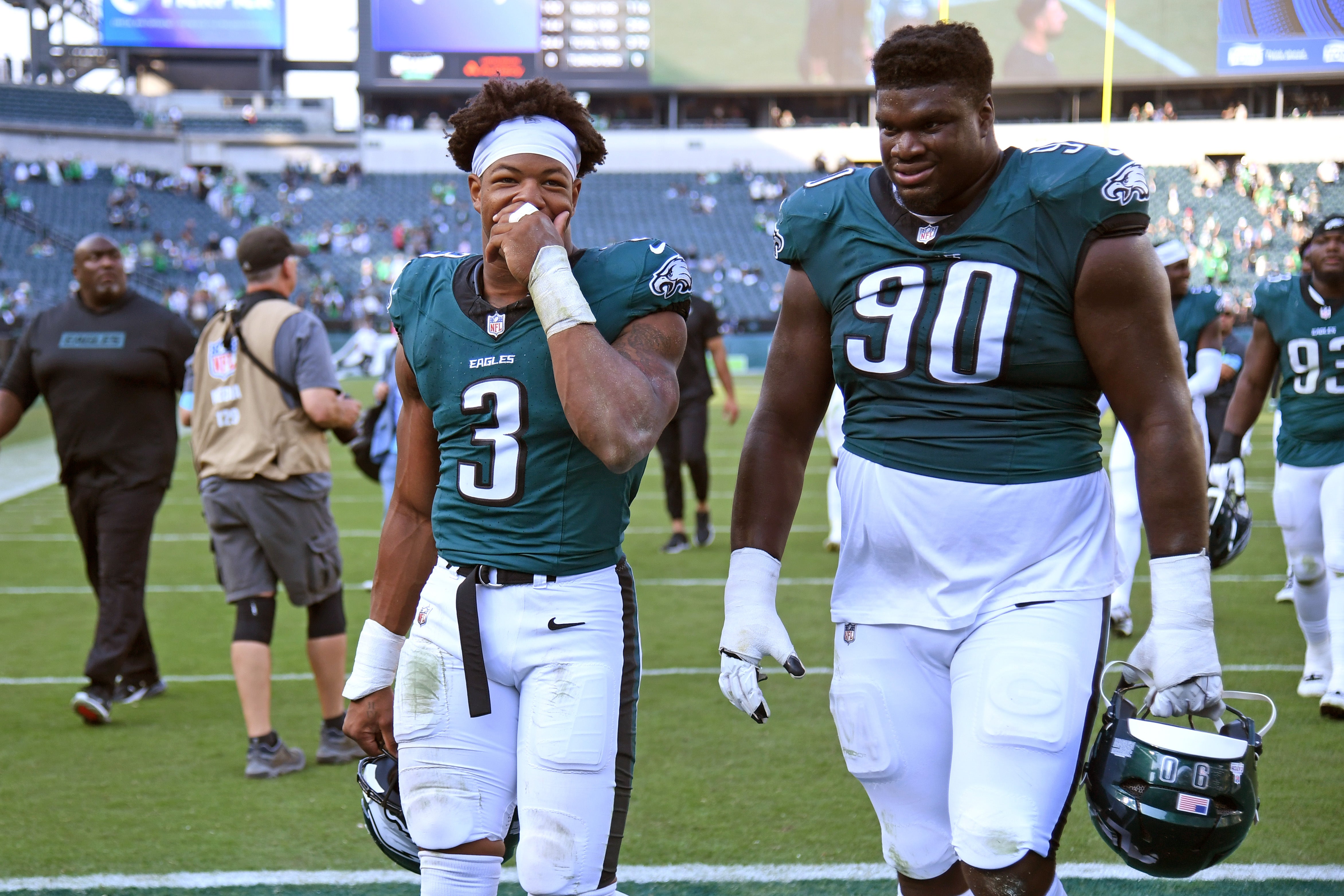 Philadelphia Eagles linebacker Nolan Smith Jr. (3) and defensive tackle Jordan Davis (90) walks off the field after win against the Cleveland Browns at Lincoln Financial Field.