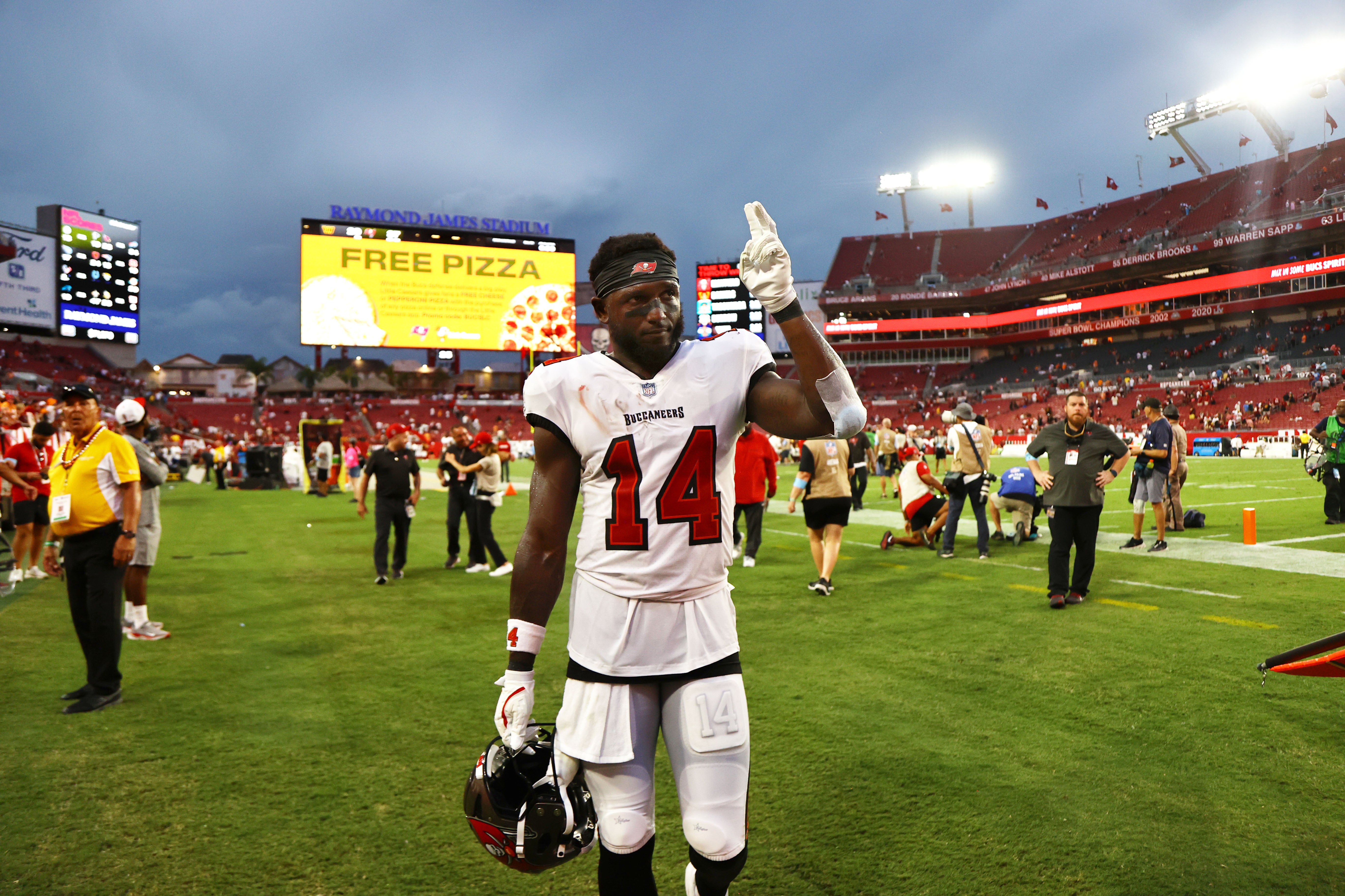 Sep 8, 2024; Tampa, Florida, USA; Tampa Bay Buccaneers wide receiver Chris Godwin (14) greets the fans after they beat the Washington Commanders at Raymond James Stadium.