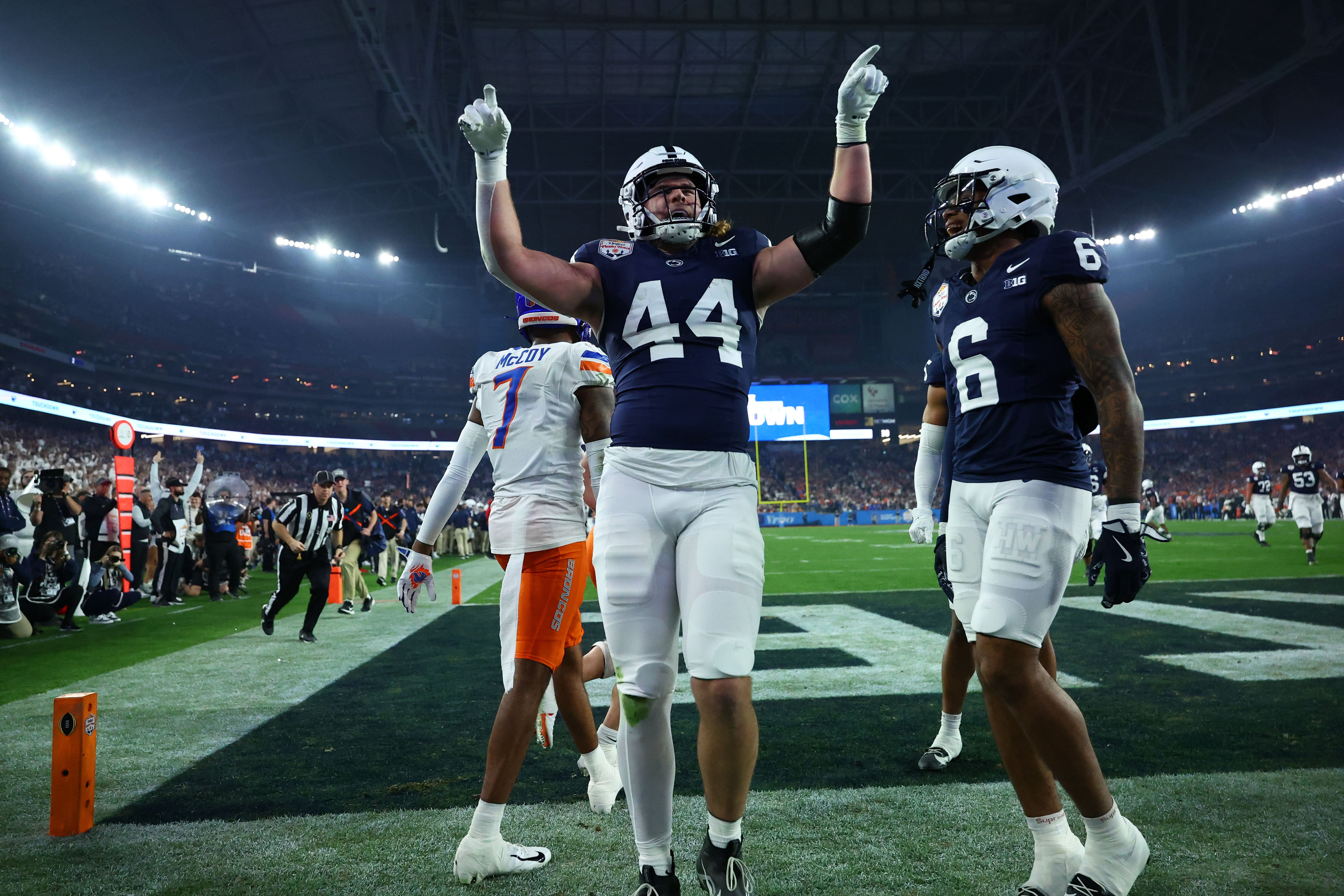 Penn State Nittany Lions tight end Tyler Warren (44) reacts with wide receiver Harrison Wallace III (6) after scoring a touchdown against the Boise State Broncos during the first half in the Fiesta Bowl at State Farm Stadium. 