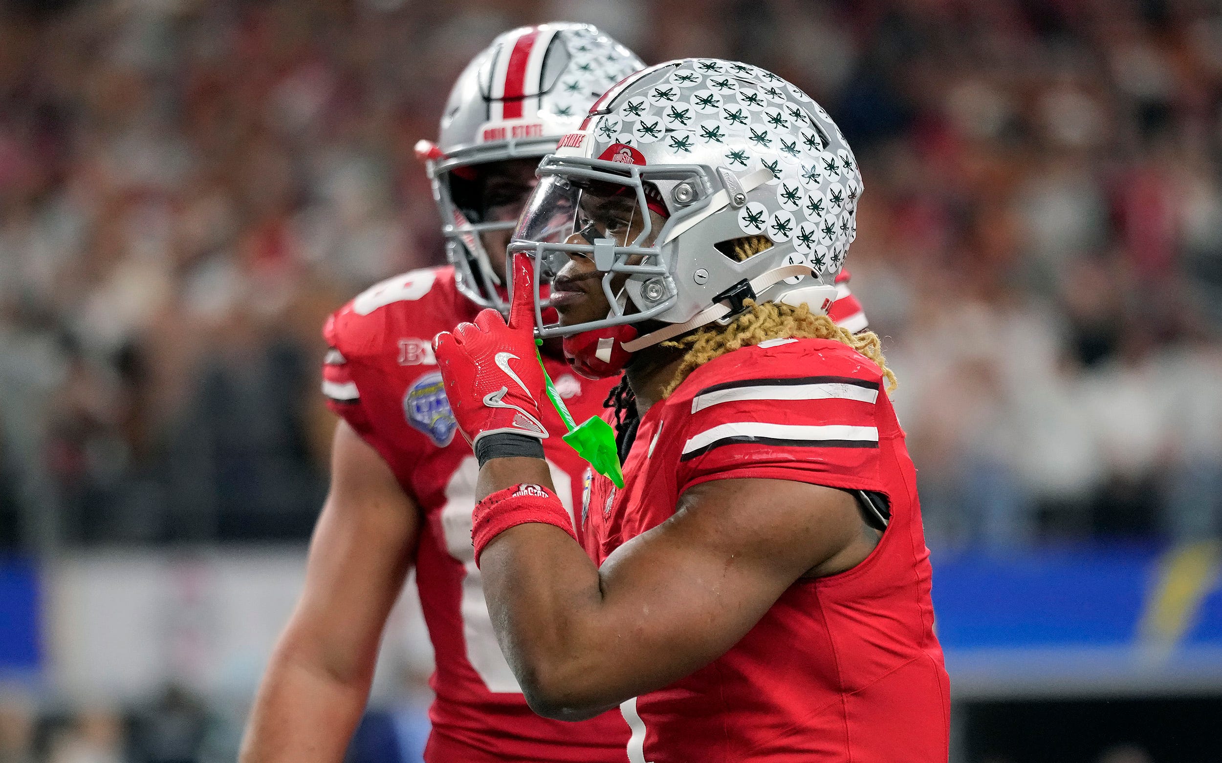 Ohio State Buckeyes running back Quinshon Judkins (1) celebrates his touchdown run against Texas Longhorns in the fourth quarter of the Cotton Bowl Classic during the College Football Playoff semifinal game at AT&T Stadium in Arlington, Texas on January, 10, 2025.