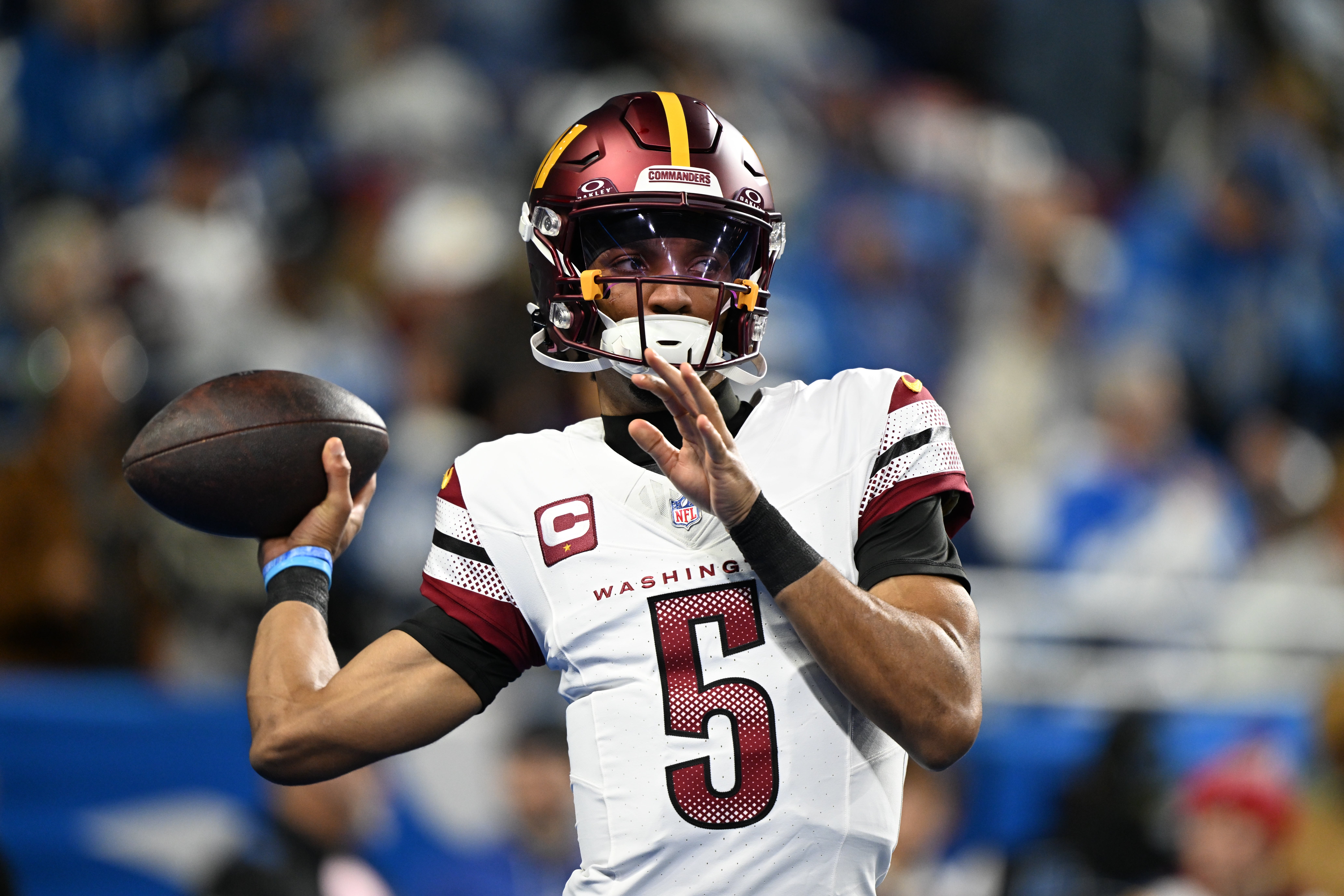 Jan 18, 2025; Detroit, Michigan, USA; Washington Commanders quarterback Jayden Daniels (5) warms up prior to the game against Detroit Lions in a 2025 NFC divisional round game at Ford Field.