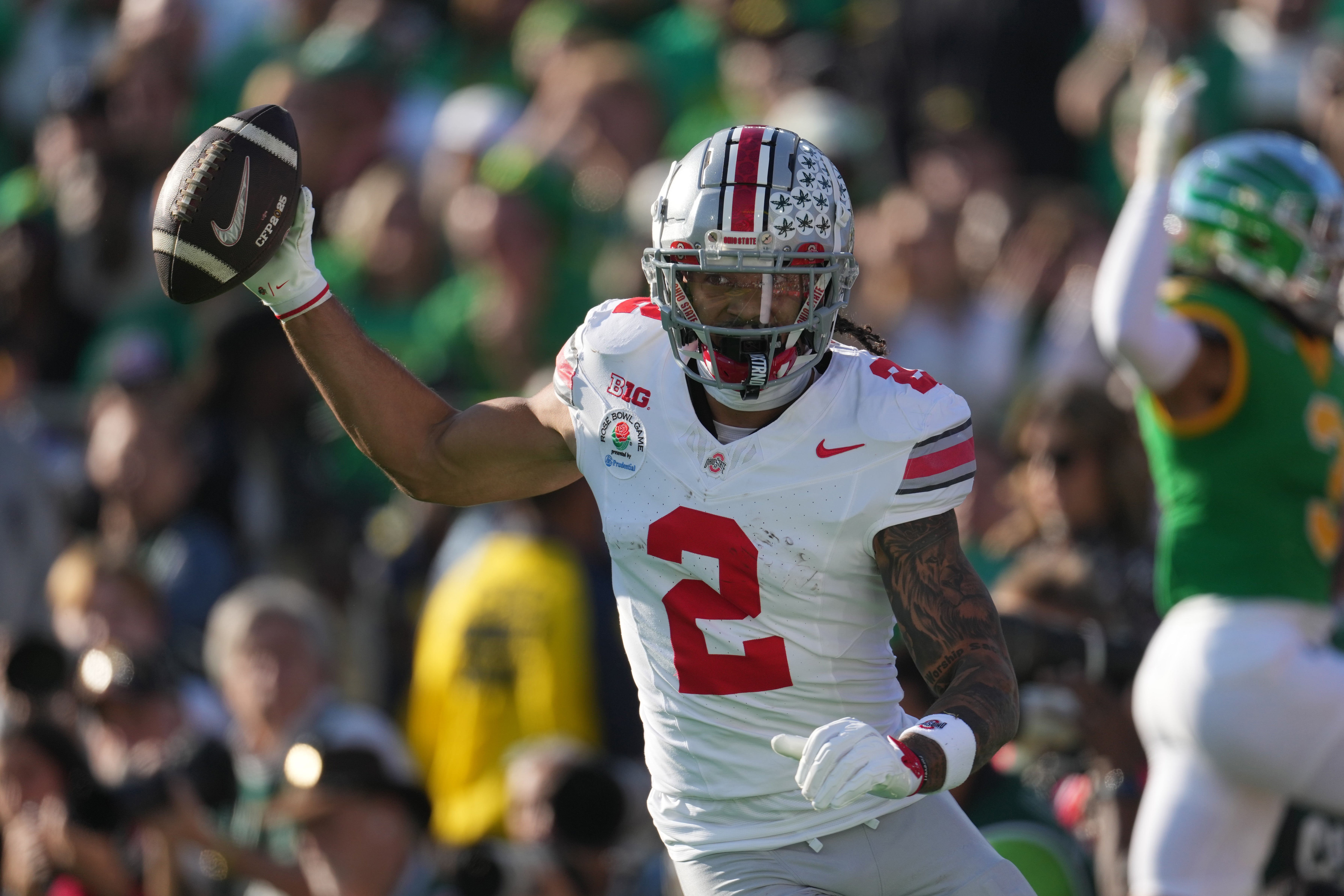Jan 1, 2025; Pasadena, CA, USA; Ohio State Buckeyes wide receiver Emeka Egbuka (2) celebrates after scoring a touchdown against the Oregon Ducks in the first quarter during the 2025 Rose Bowl college football quarterfinal game at Rose Bowl Stadium.